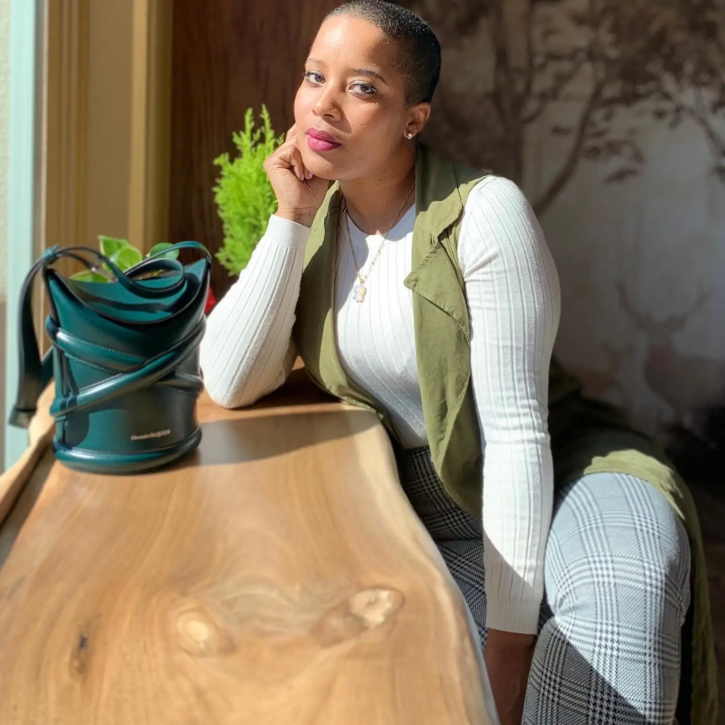 Jatee Kearsley sitting at a bench