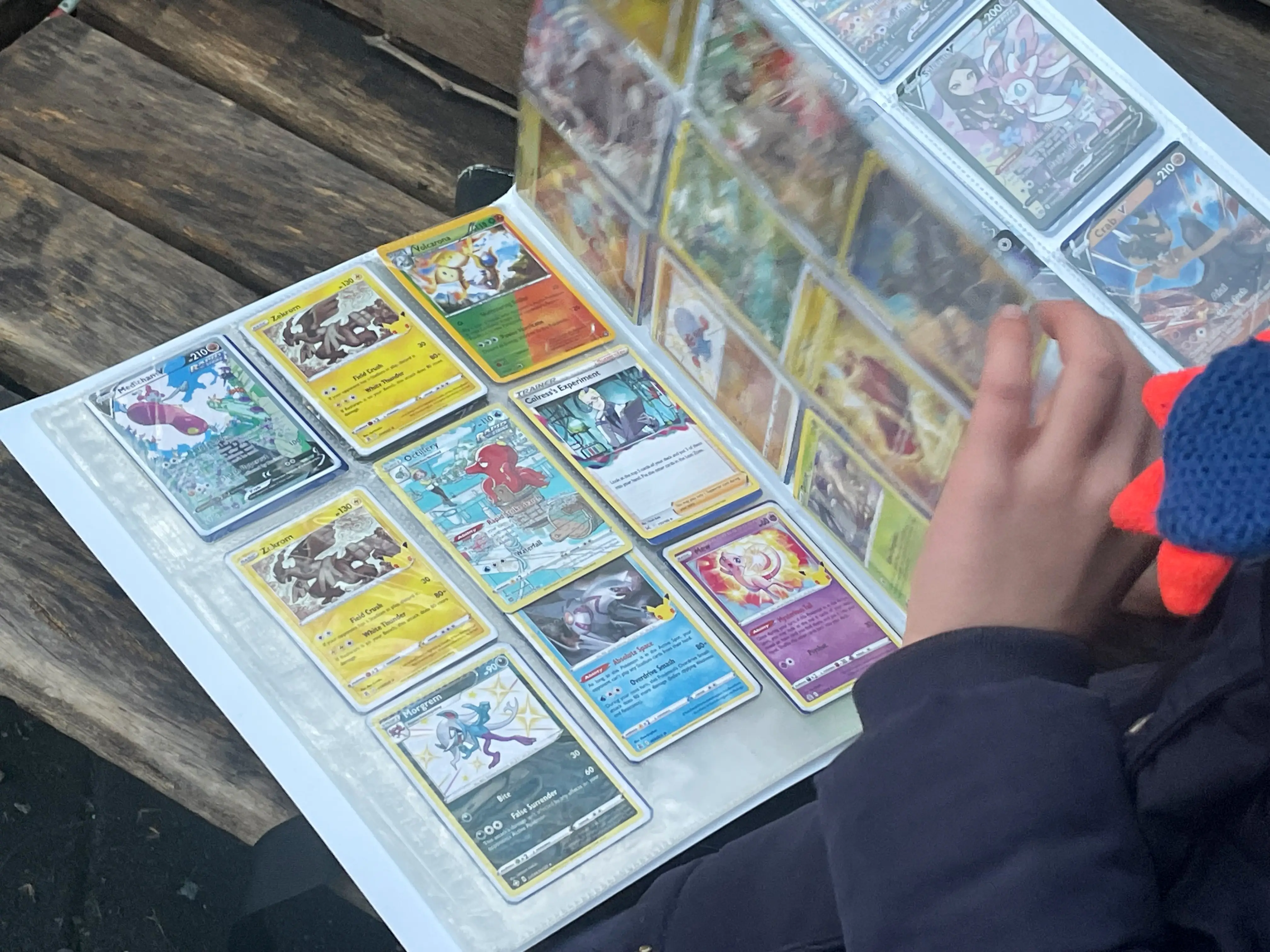 Boy with Pokémon cards.