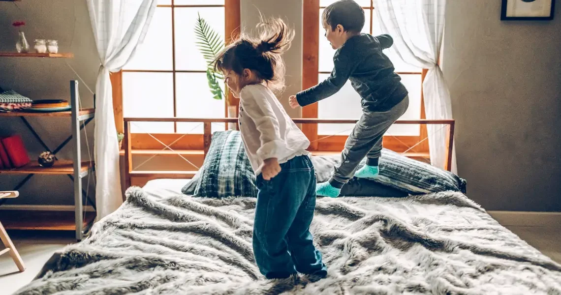 2 kids, 2 adults, 1 queen bed, and no personal space. I regret not splurging on a king-size mattress while my kids were little.