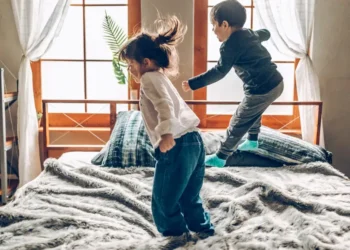 2 kids, 2 adults, 1 queen bed, and no personal space. I regret not splurging on a king-size mattress while my kids were little.