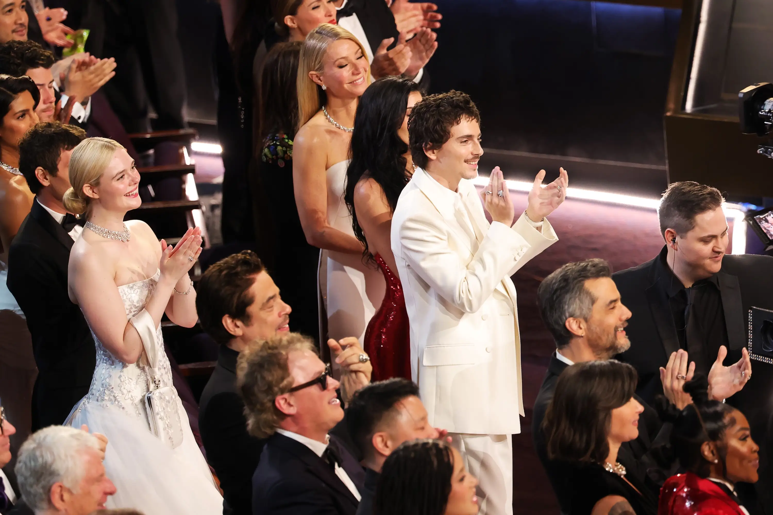 Timothée Chalamet applauds inside the 2026 Oscars ceremony.