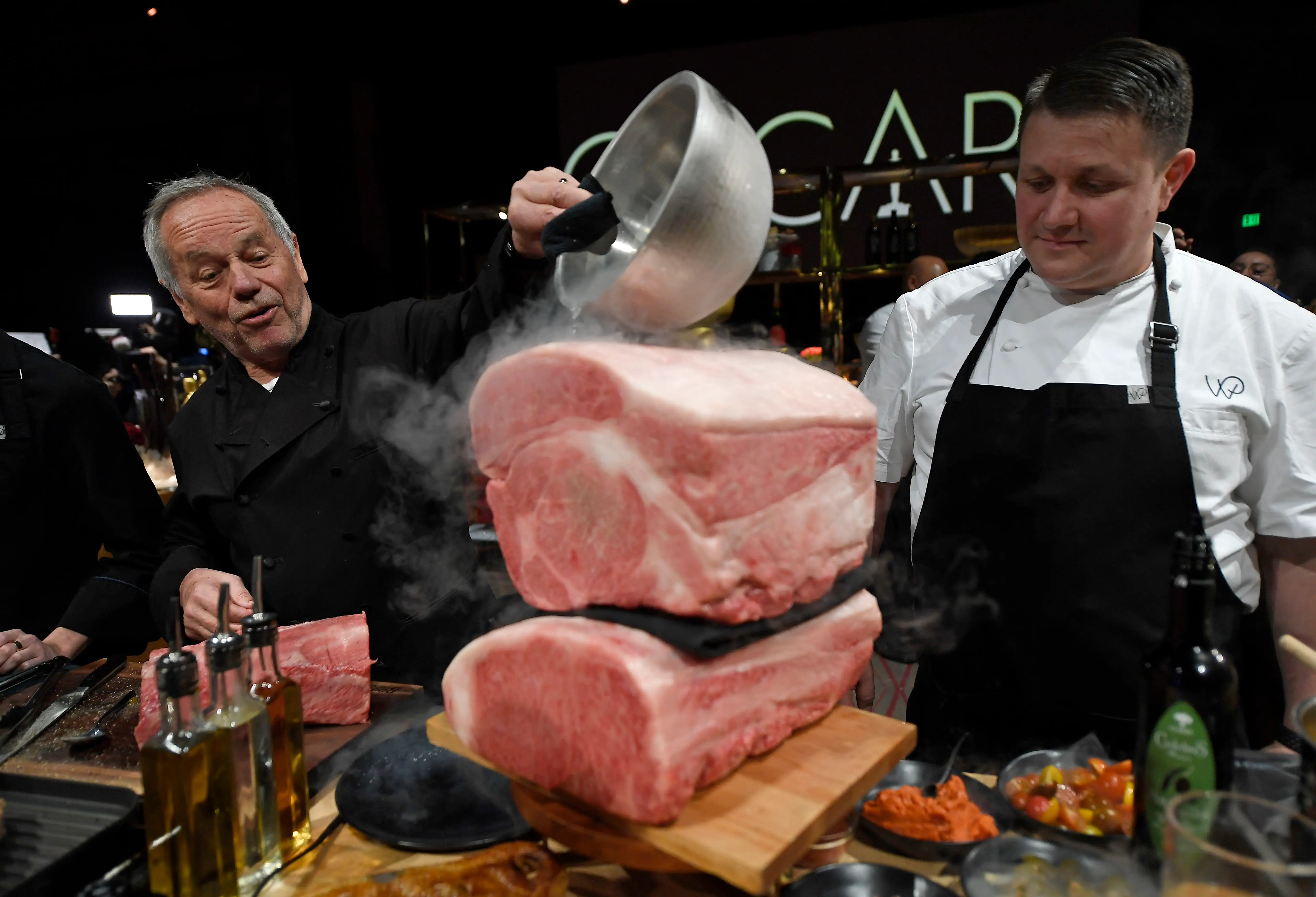 Wolfgang Puck pours liquid nitrogen on Miyazaki wagyu beef