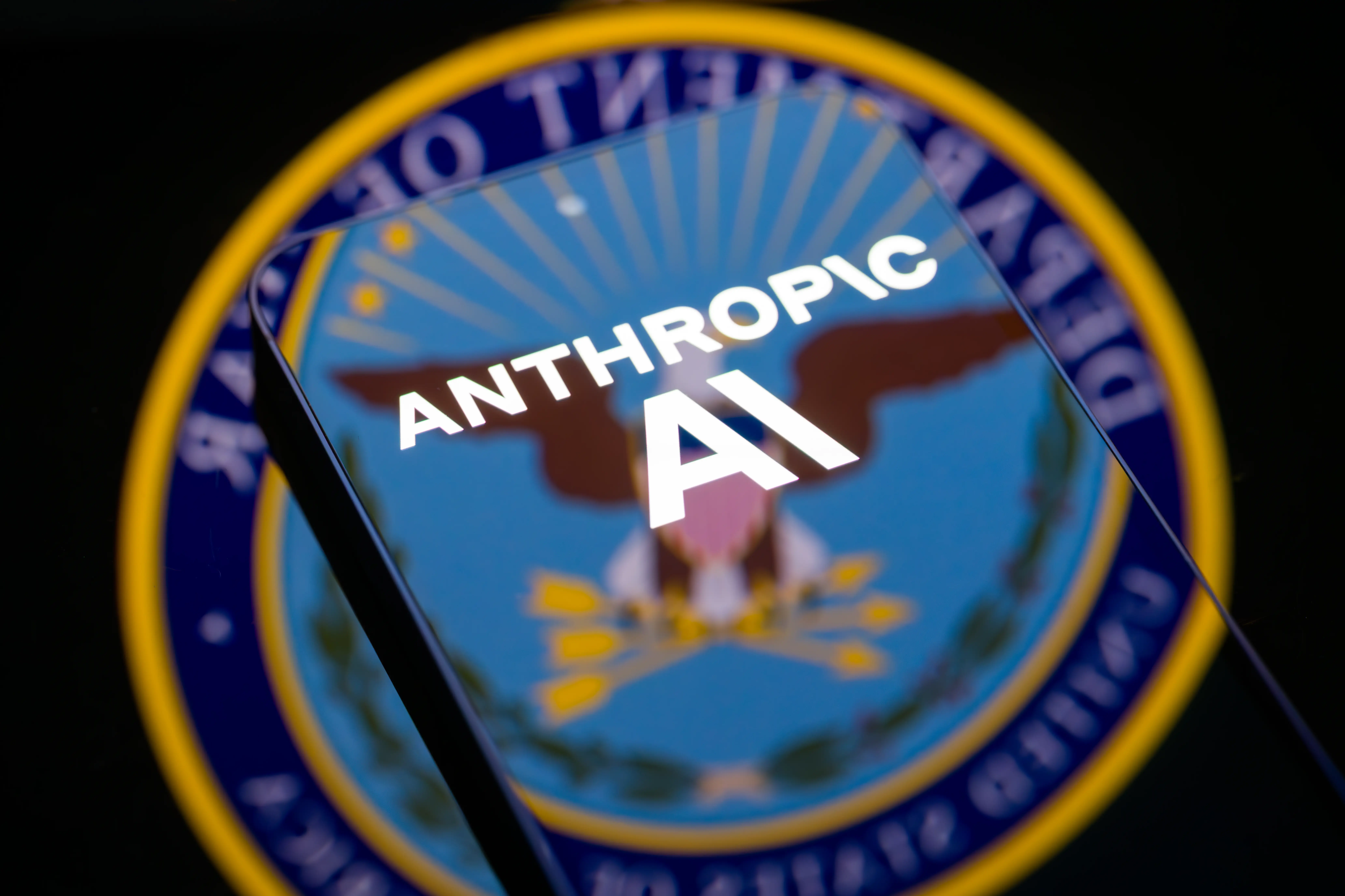 The Anthropic logo appears on a smartphone screen in this photo illustration, as the AI firm files lawsuits against the United States Department of Defense after the Pentagon moves to blacklist the company following disagreements over safeguards limiting the use of its AI systems for surveillance and autonomous weapons.