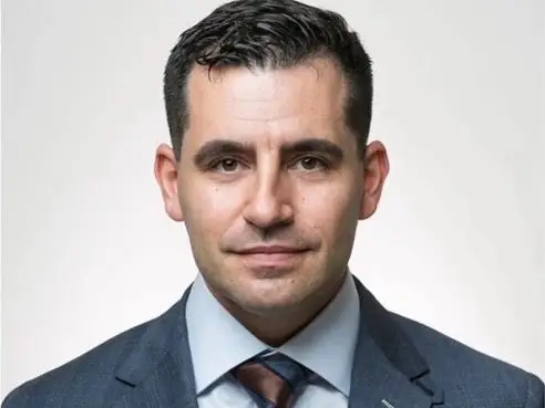 A young man in a suit