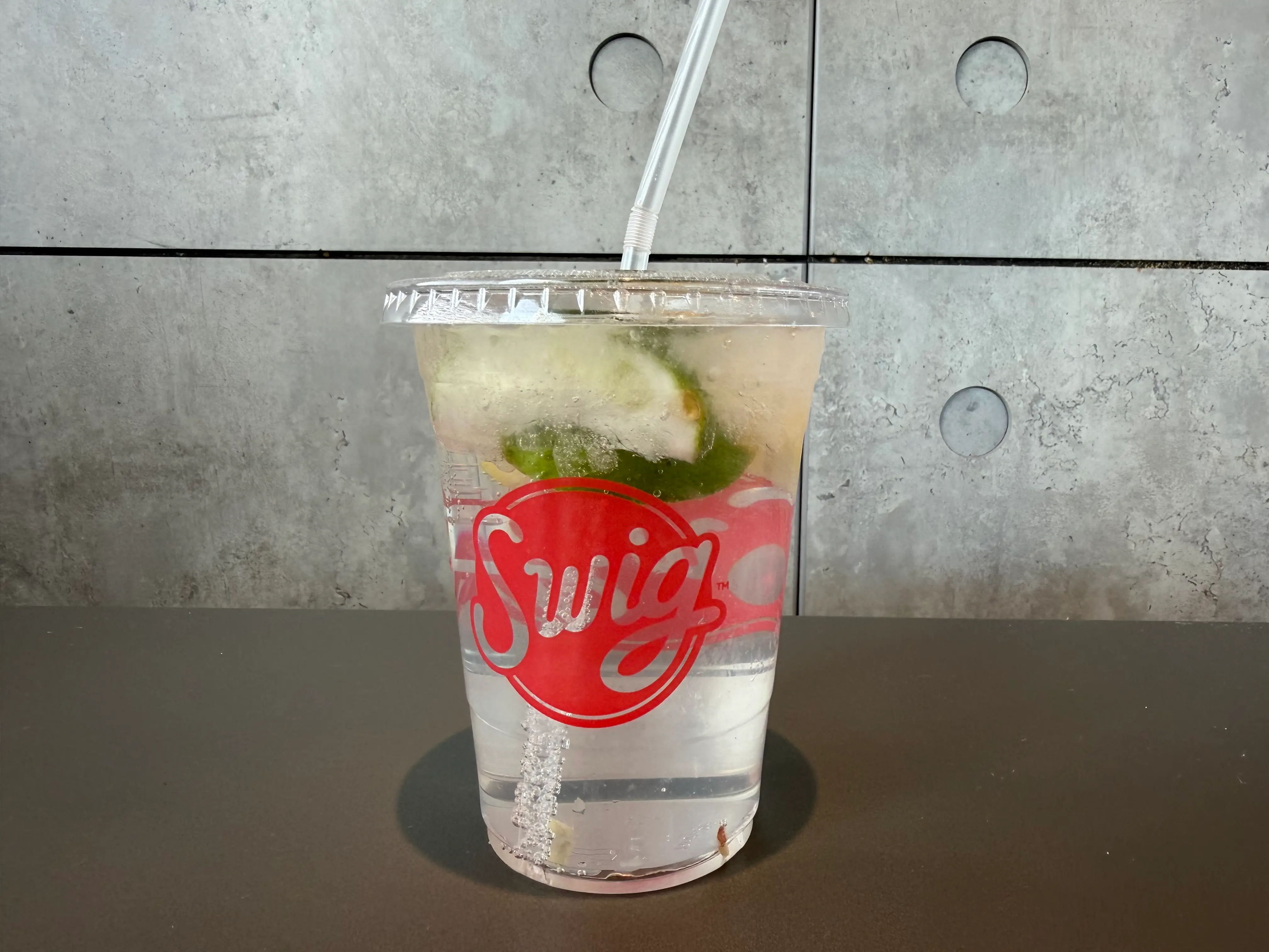 Swig cup with lemon and lime slices inside