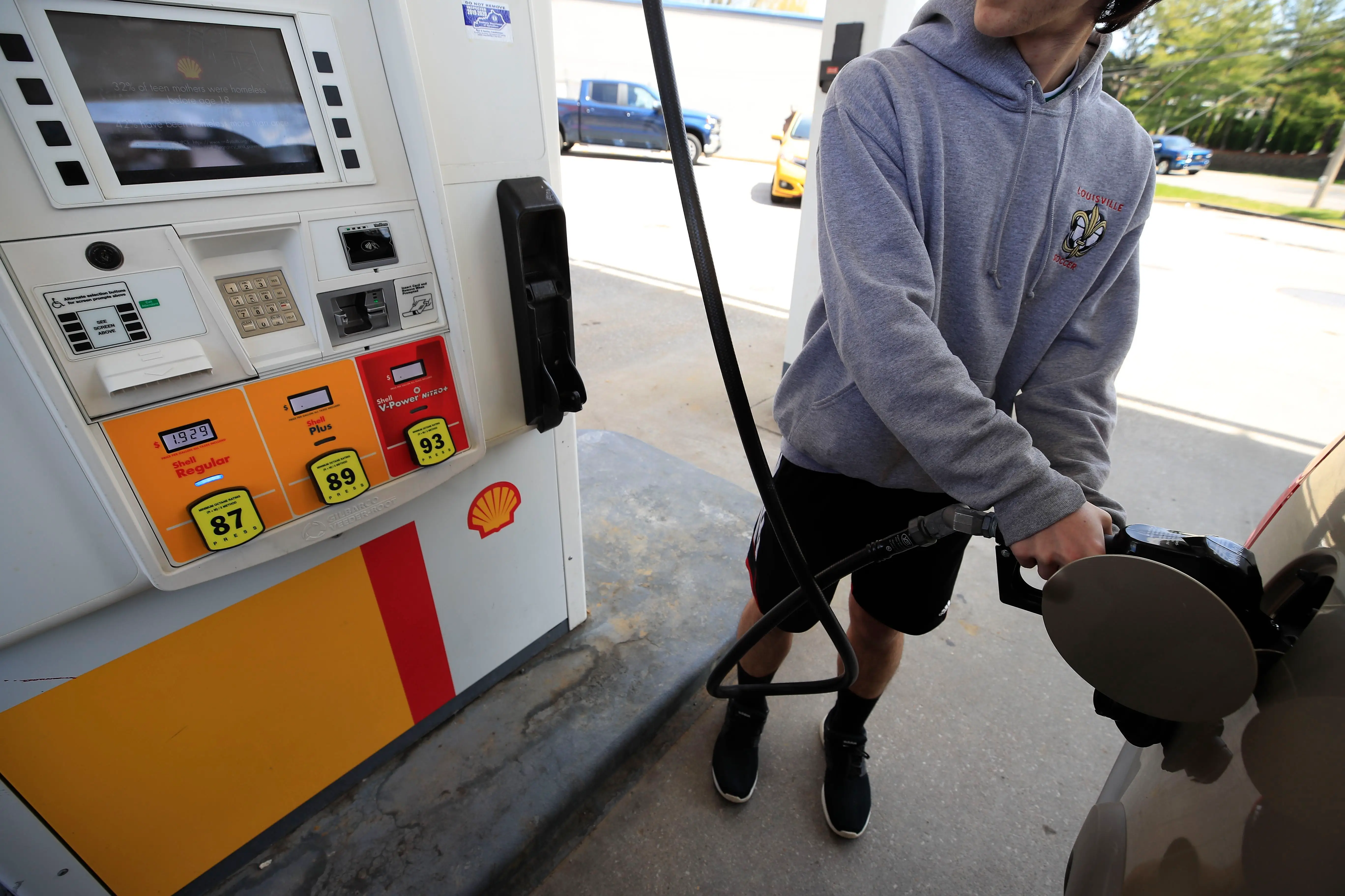A person pumps gas at a gas station as the national average falls under $2 per gallon amid the coronavirus pandemic on April 02, 2020 in Louisville, Kentucky.