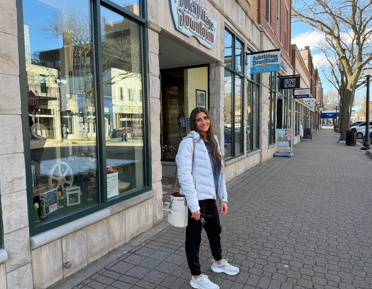 The writer posing in front of the Dutch Village downtown.