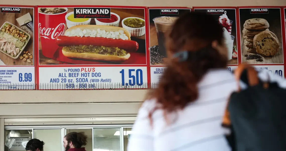 Costco’s CEO chows down on a $1.50 hot dog combo in the latest riff on the McDonald’s burger meme
