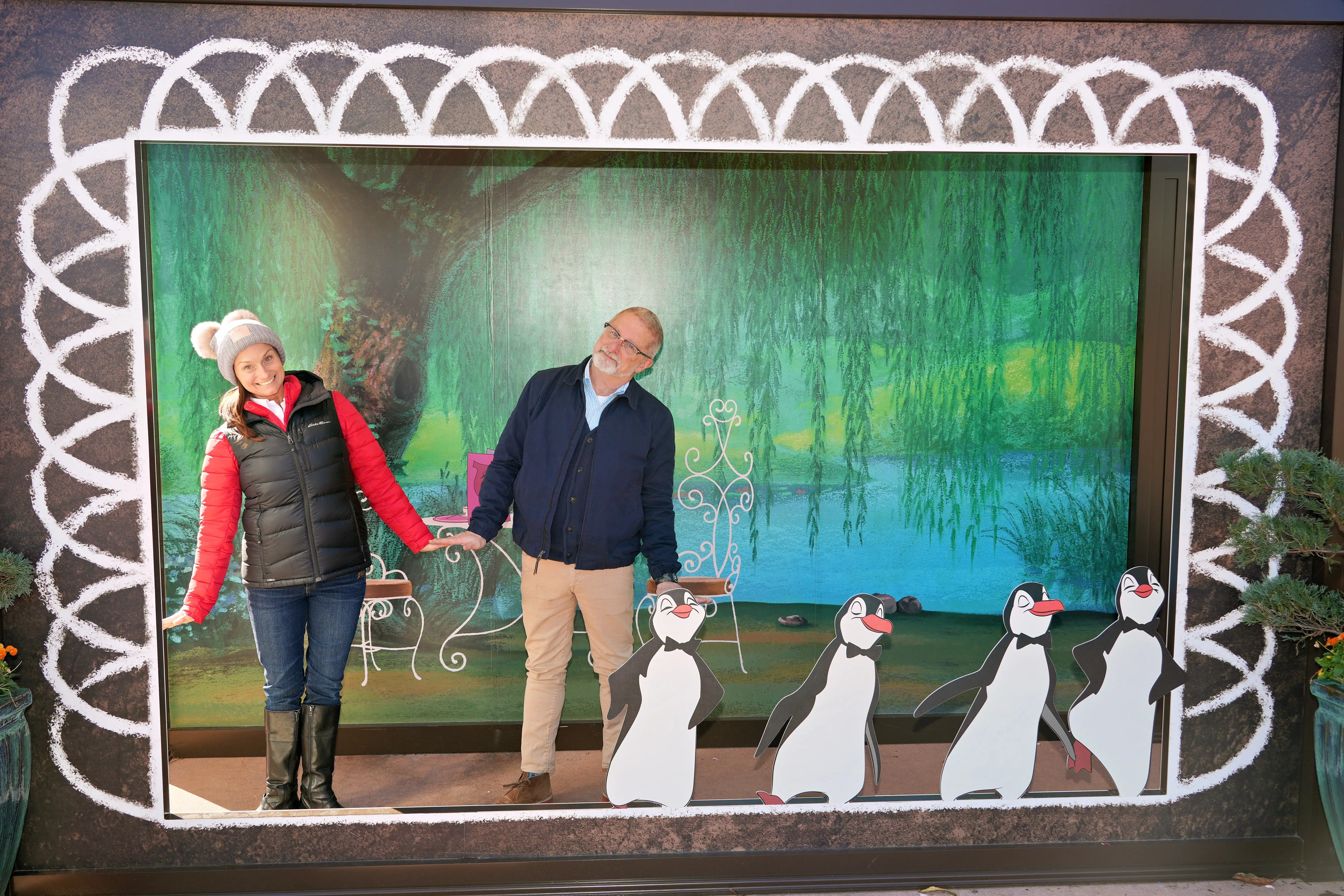 Couple posing for photo at Disney