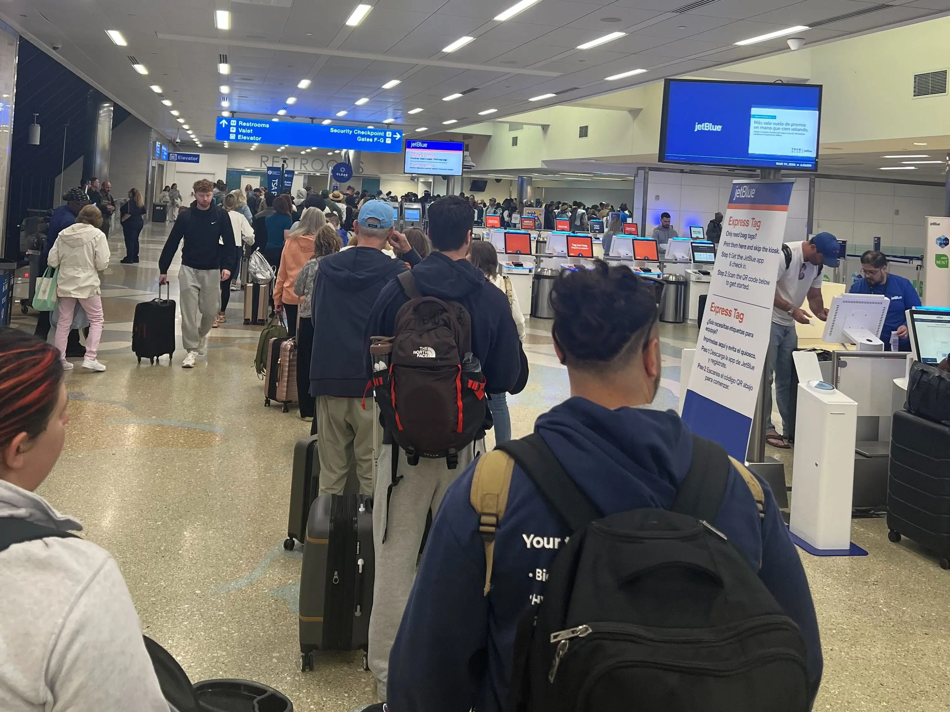 Passengers in line at Fort Lauderdale airport.