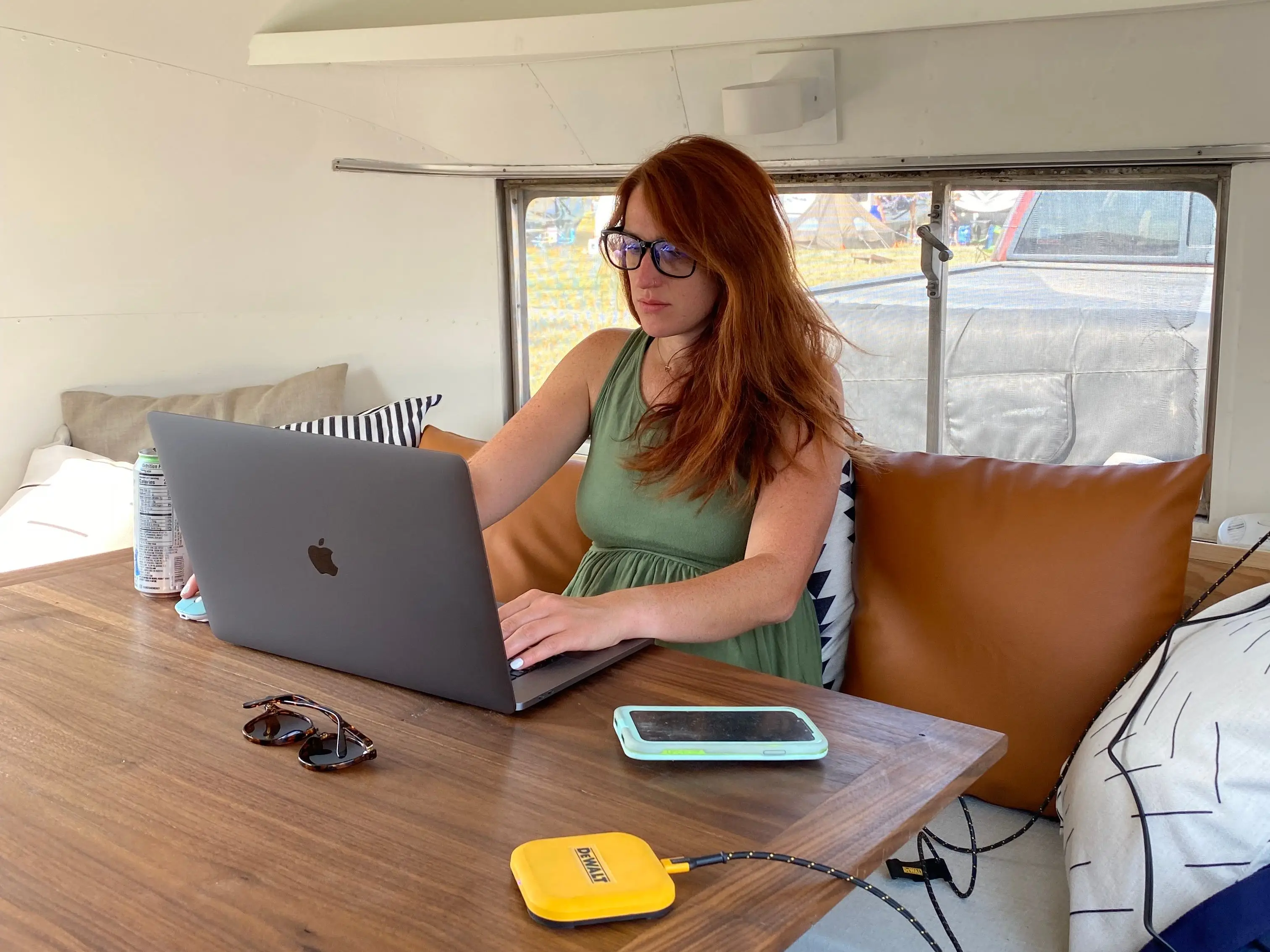 Woman working from airstream