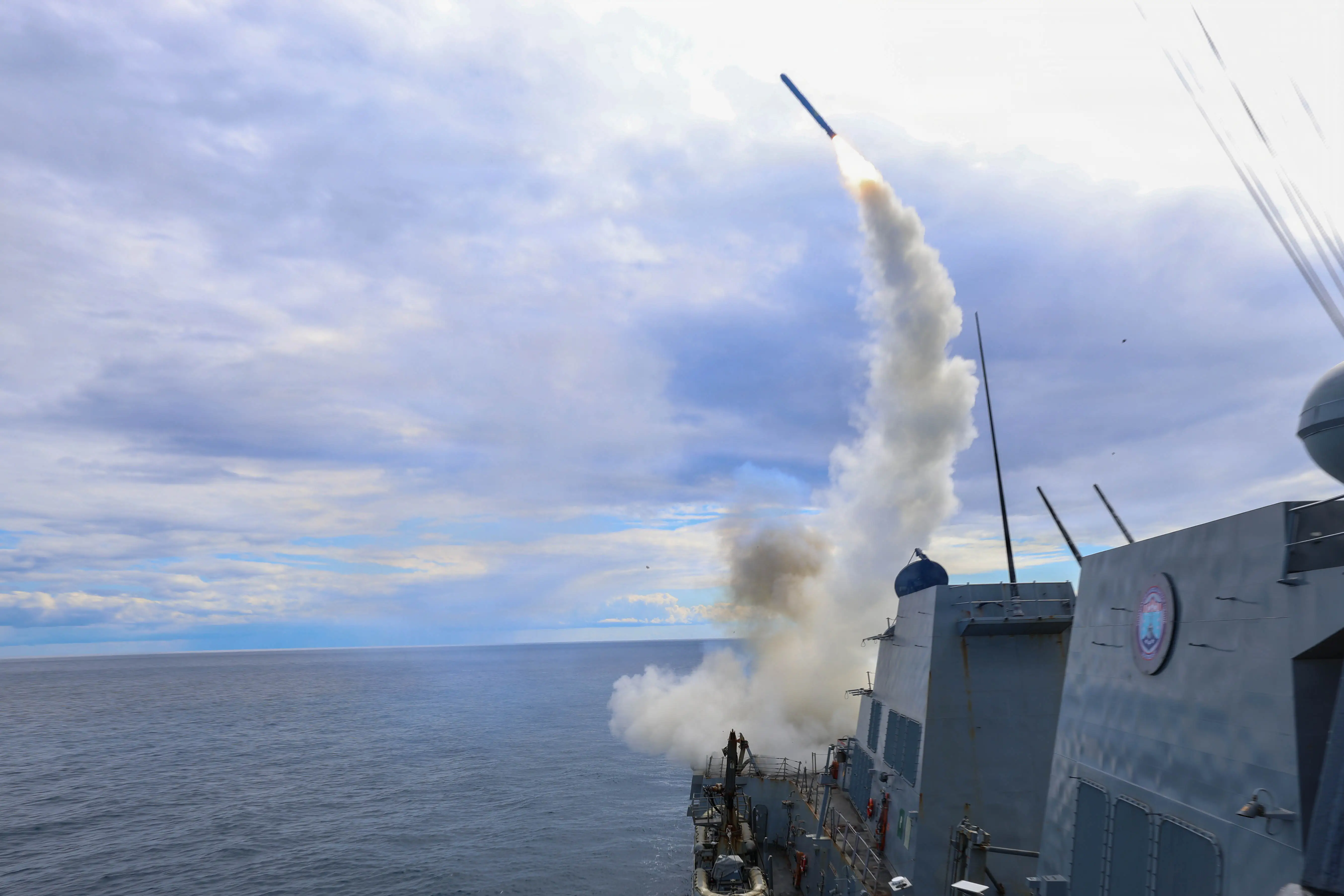 A US Navy destroyer launches a Tomahawk missile as part of Operation Epic Fury.