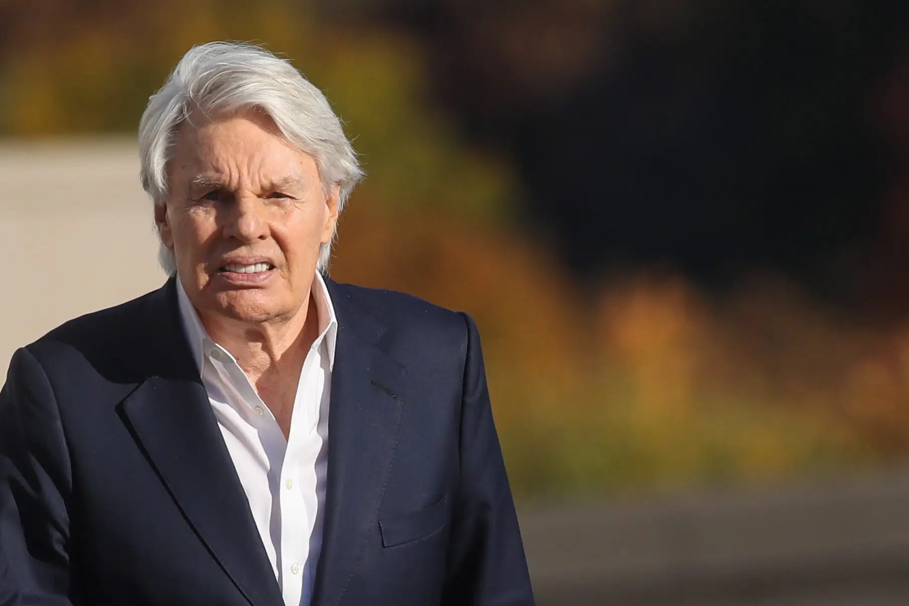 Former Abercrombie & Fitch CEO Mike Jeffries leaves court in Long Island after pleading not guilty to sex trafficking charges in 2024.