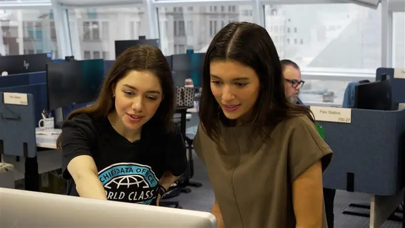 Natalie Gilbert (L) with a colleague.