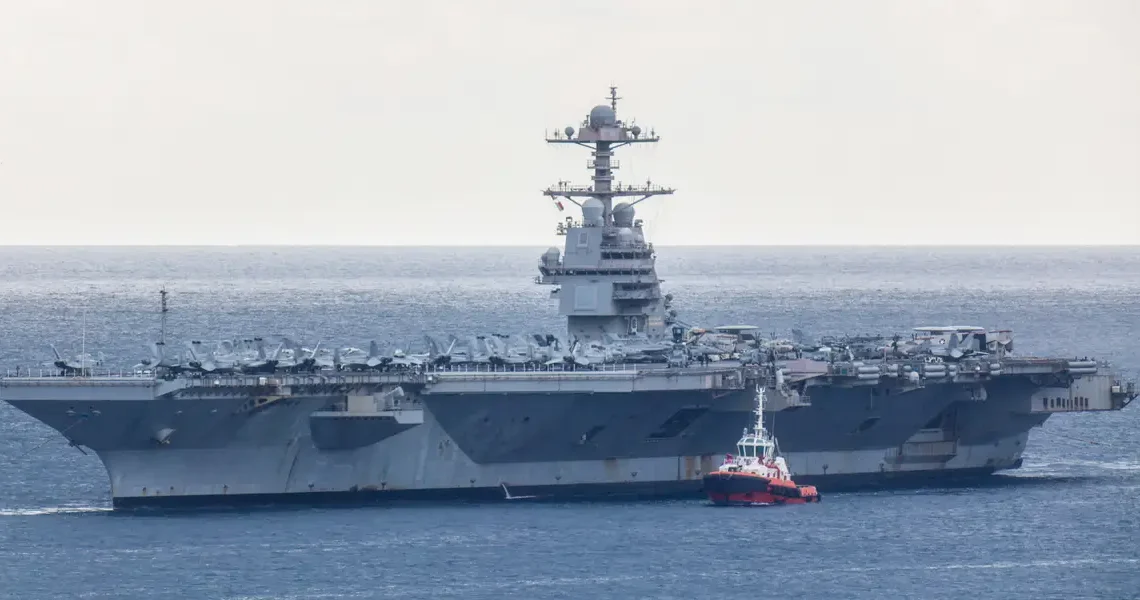 The US Navy’s most advanced aircraft carrier has pulled into port after months at sea facing combat, fire, and plumbing problems