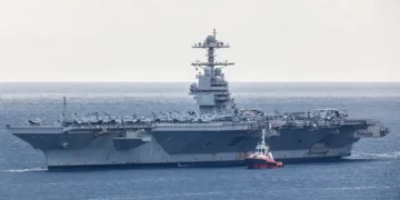 The US Navy’s most advanced aircraft carrier has pulled into port after months at sea facing combat, fire, and plumbing problems