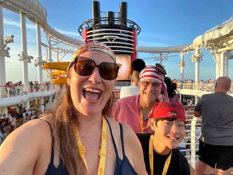 Author Jill Robbins smiling wiht family on cruise ship