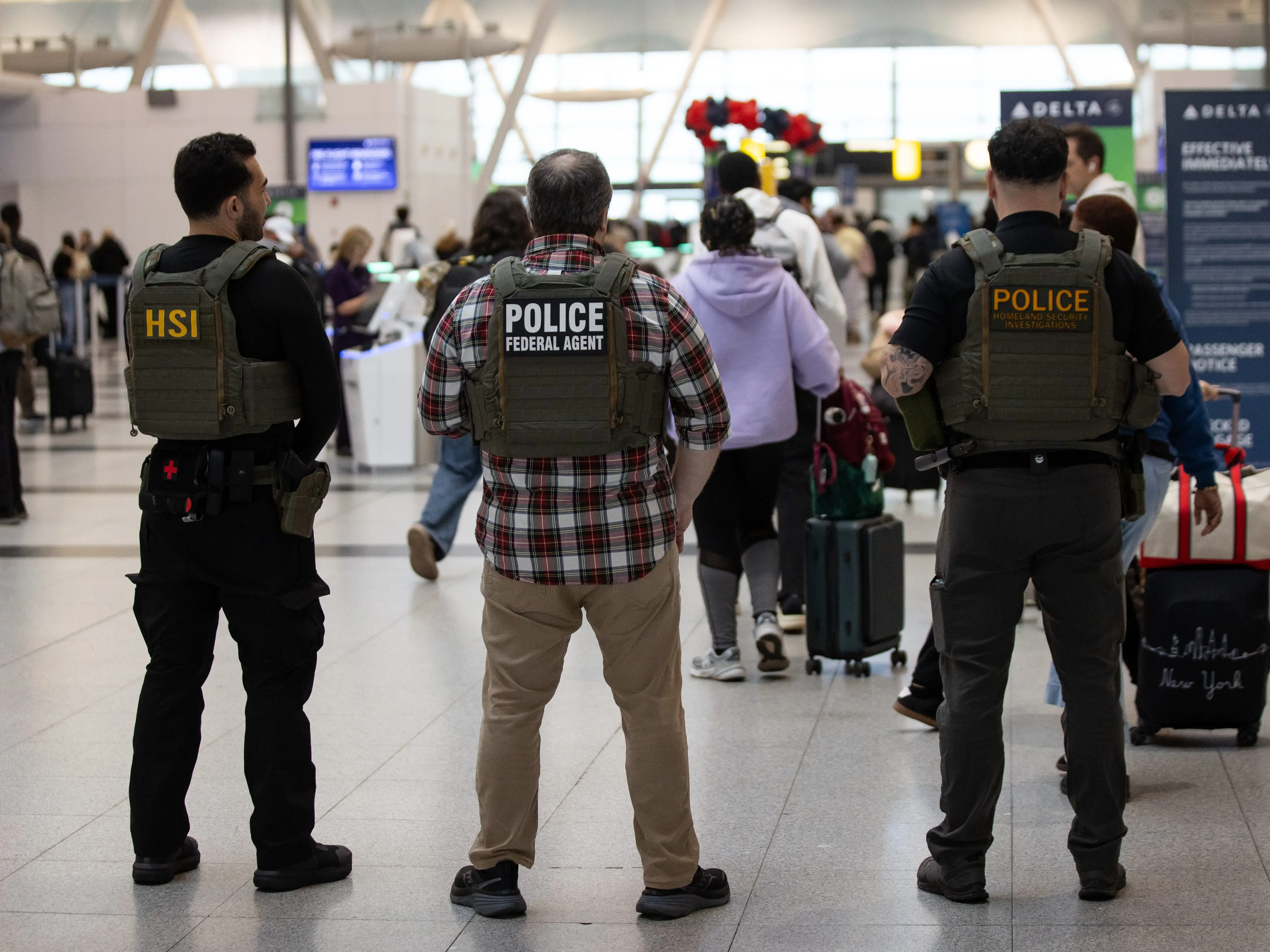 Federal agents are seen at the JFK airport as ICE agents have begun deploying at some U.S. airports amid the partial government shutdown in New York City, United States, on Monday, March 23, 2026.