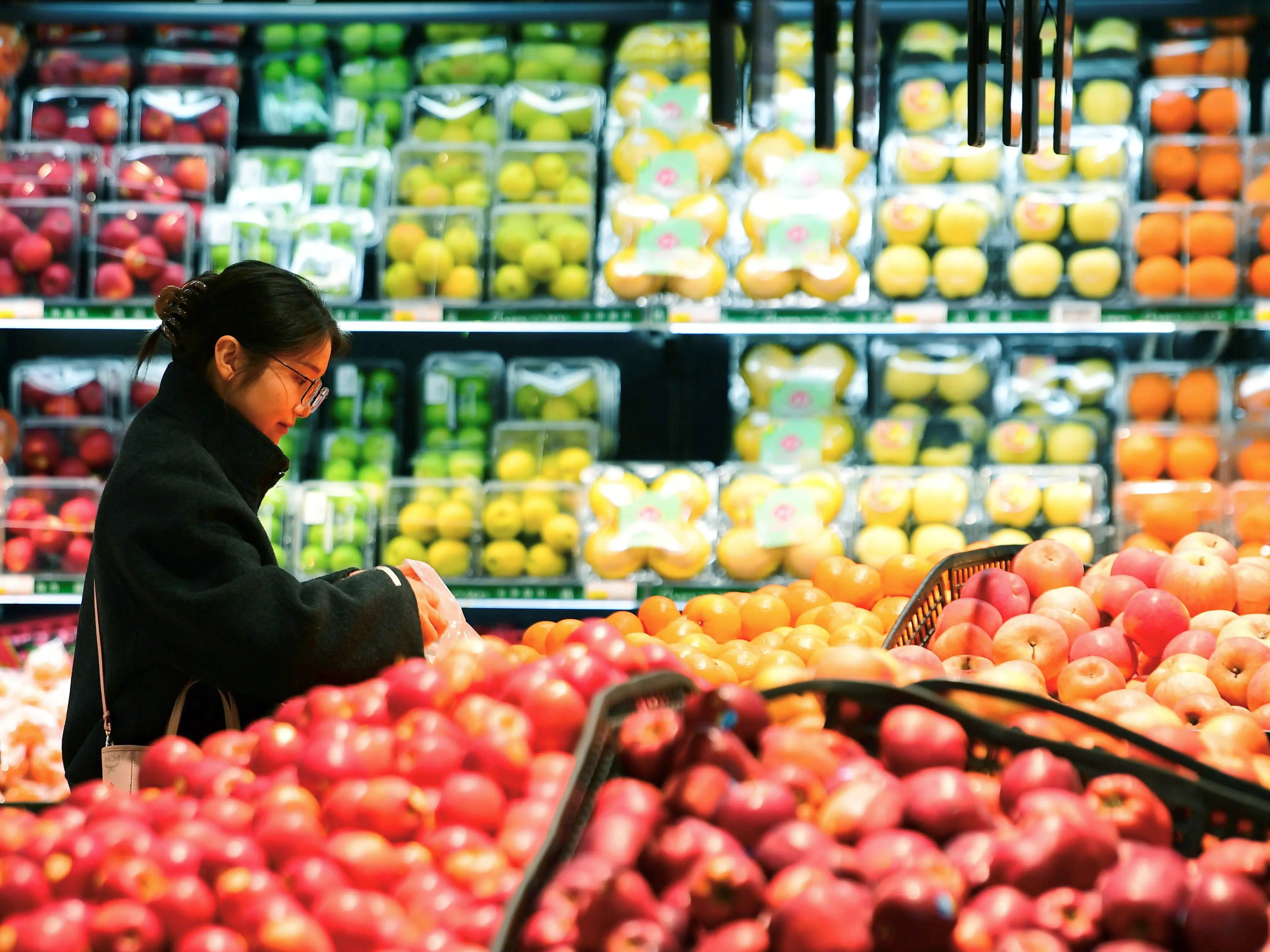 Woman grocery-shopping in China