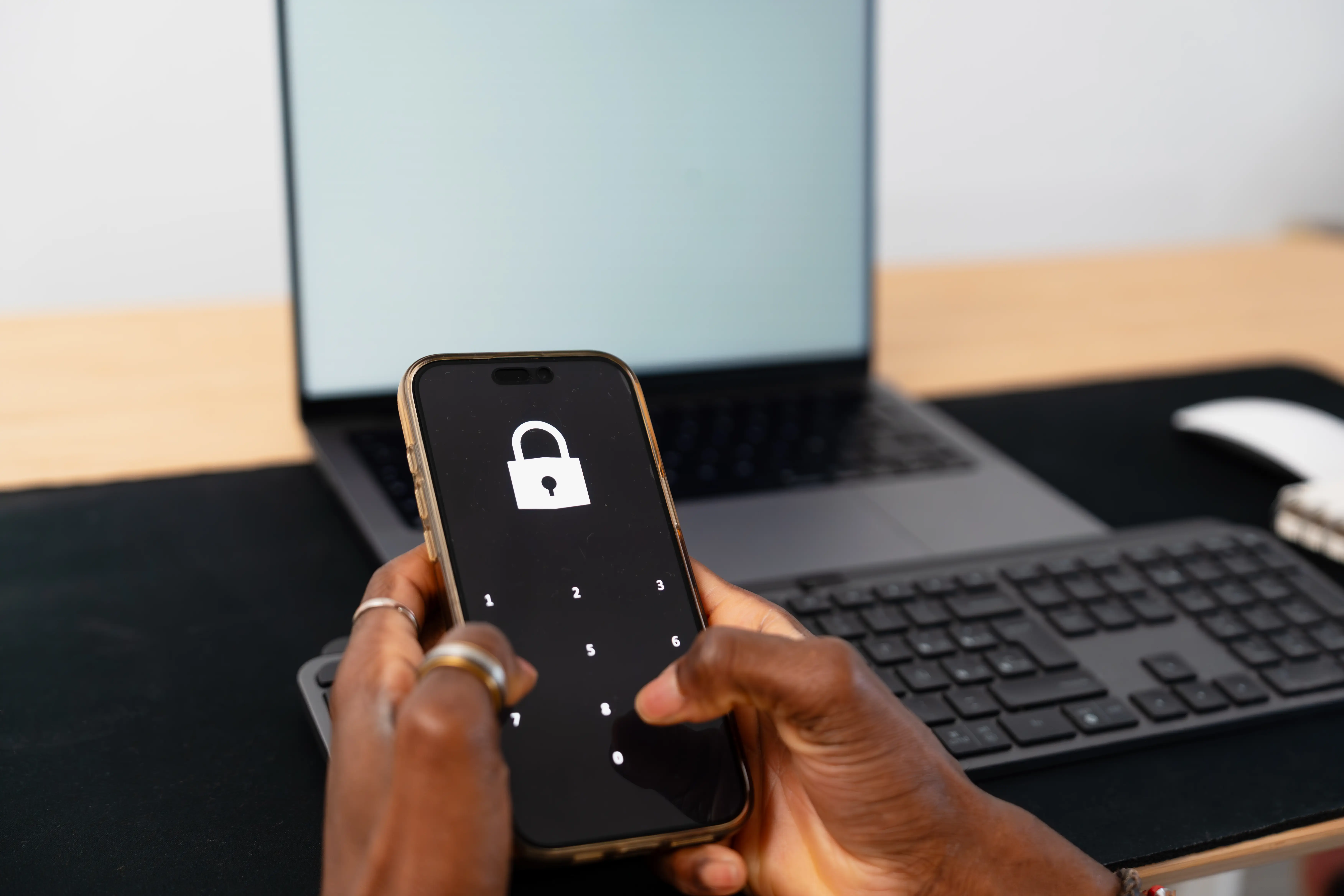 A man updates his phone passcode.