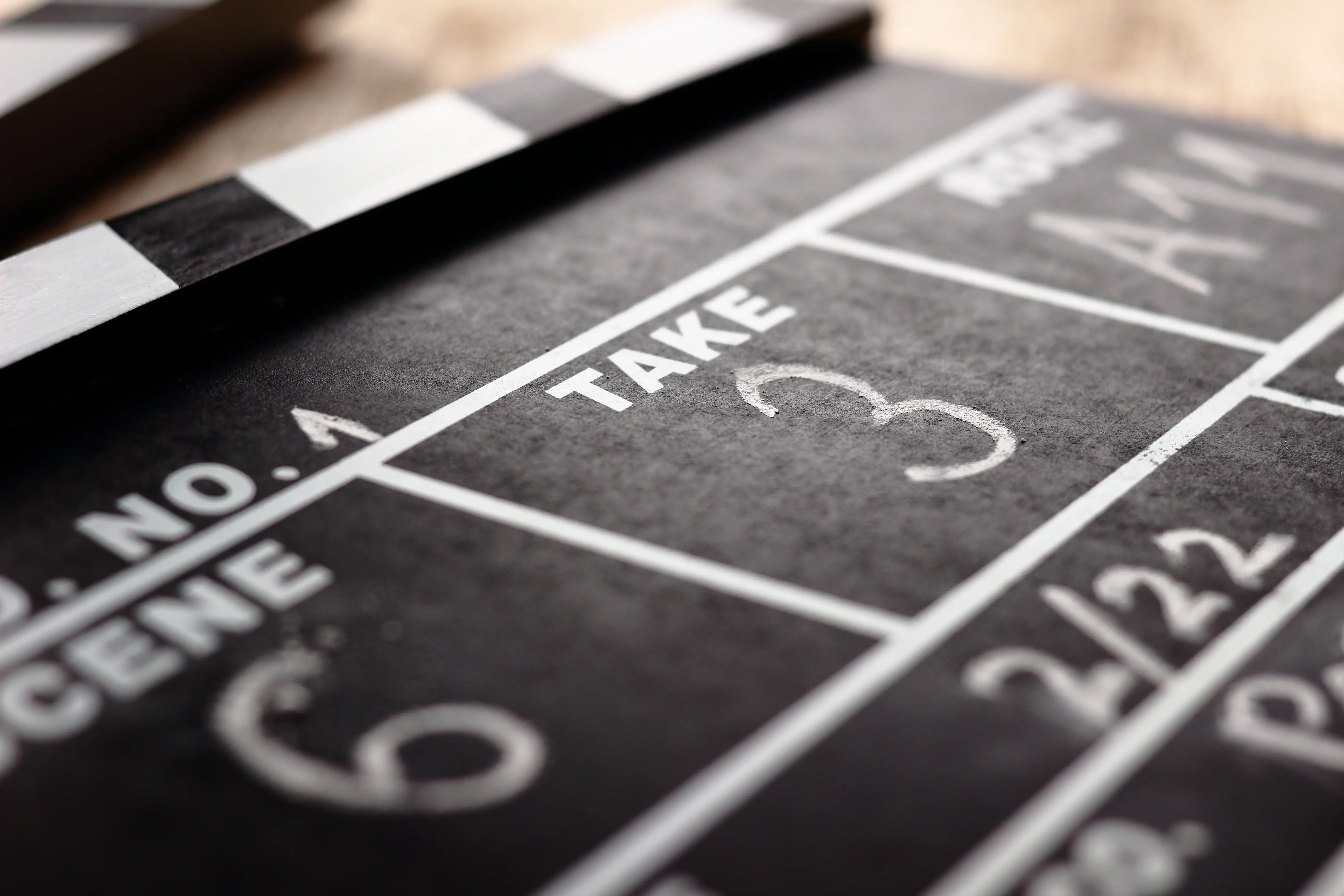 A close-up of a film clapperboard.
