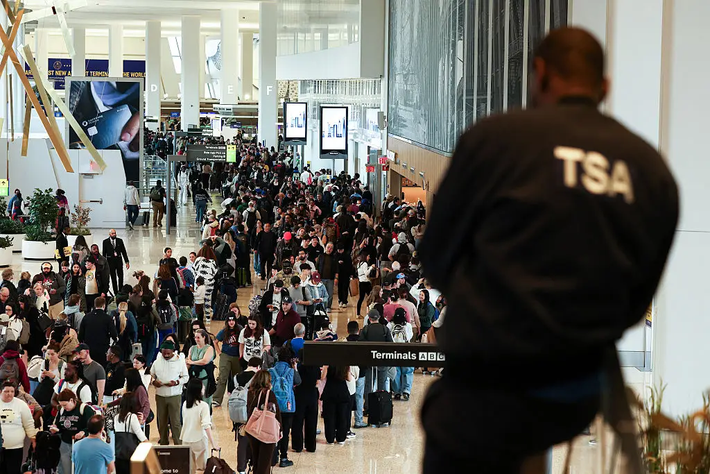 TSA employee and long lines at LGA airport