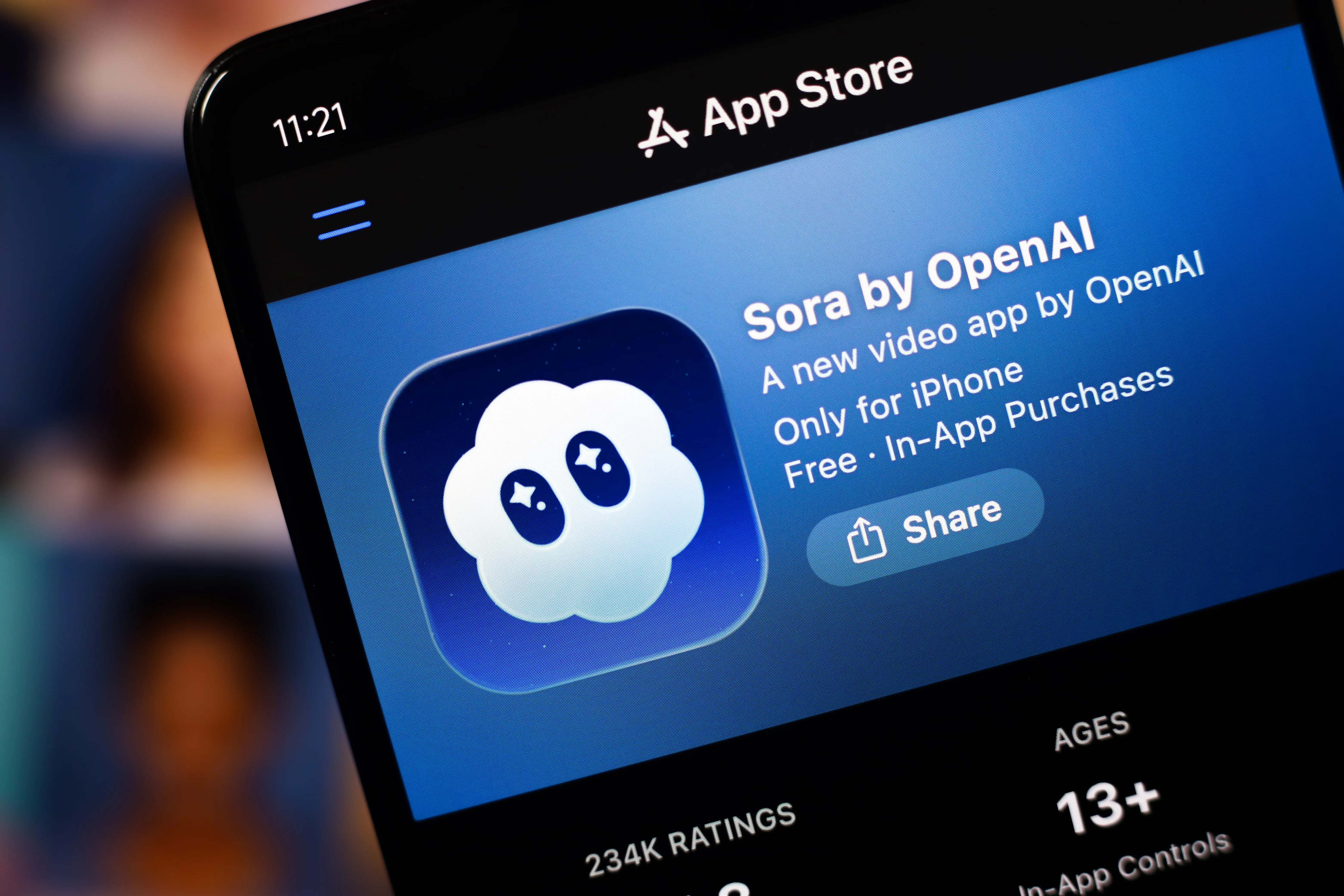 The Sora by OpenAI logo appears on the app store.