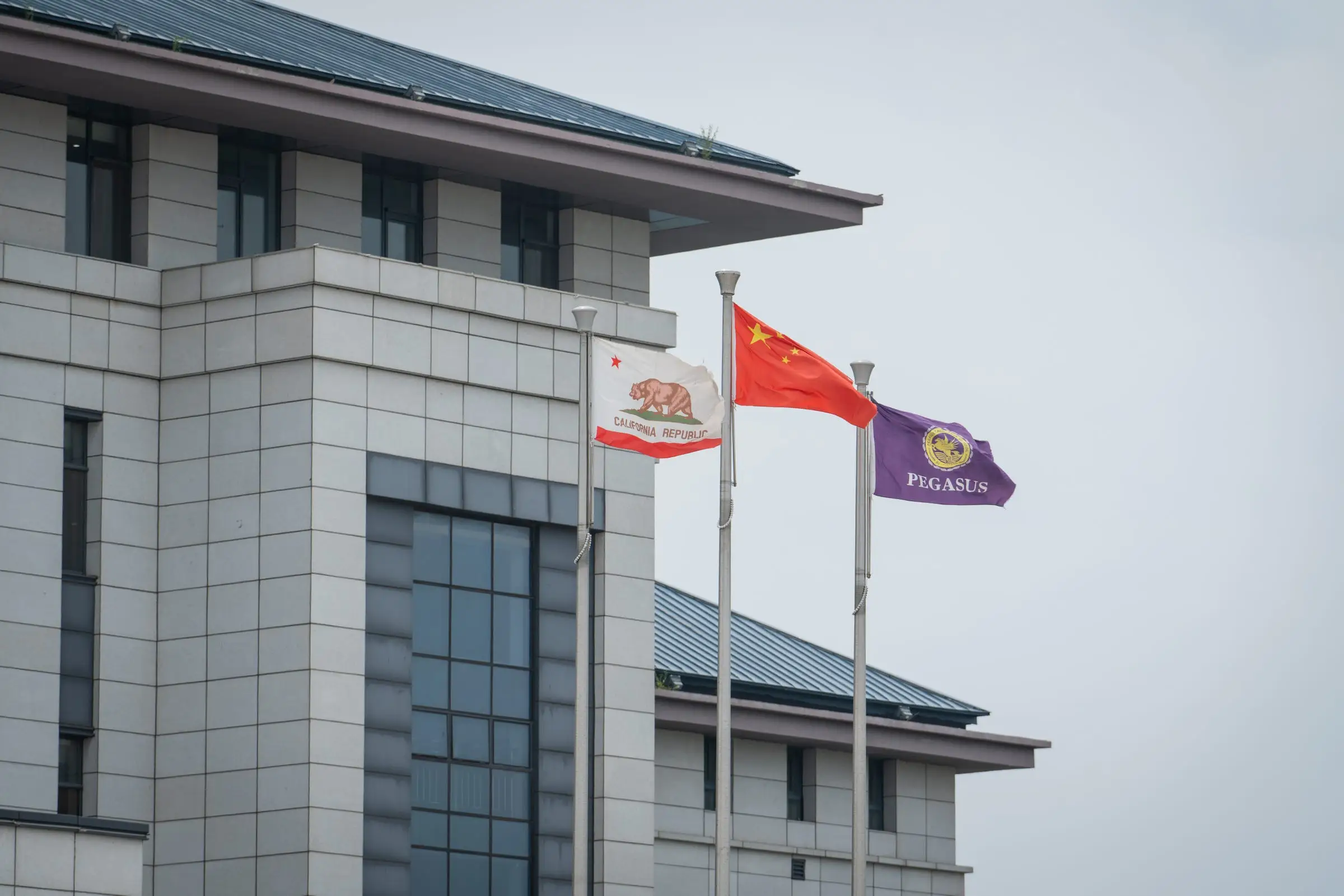 Flags outside the Pegasus California School