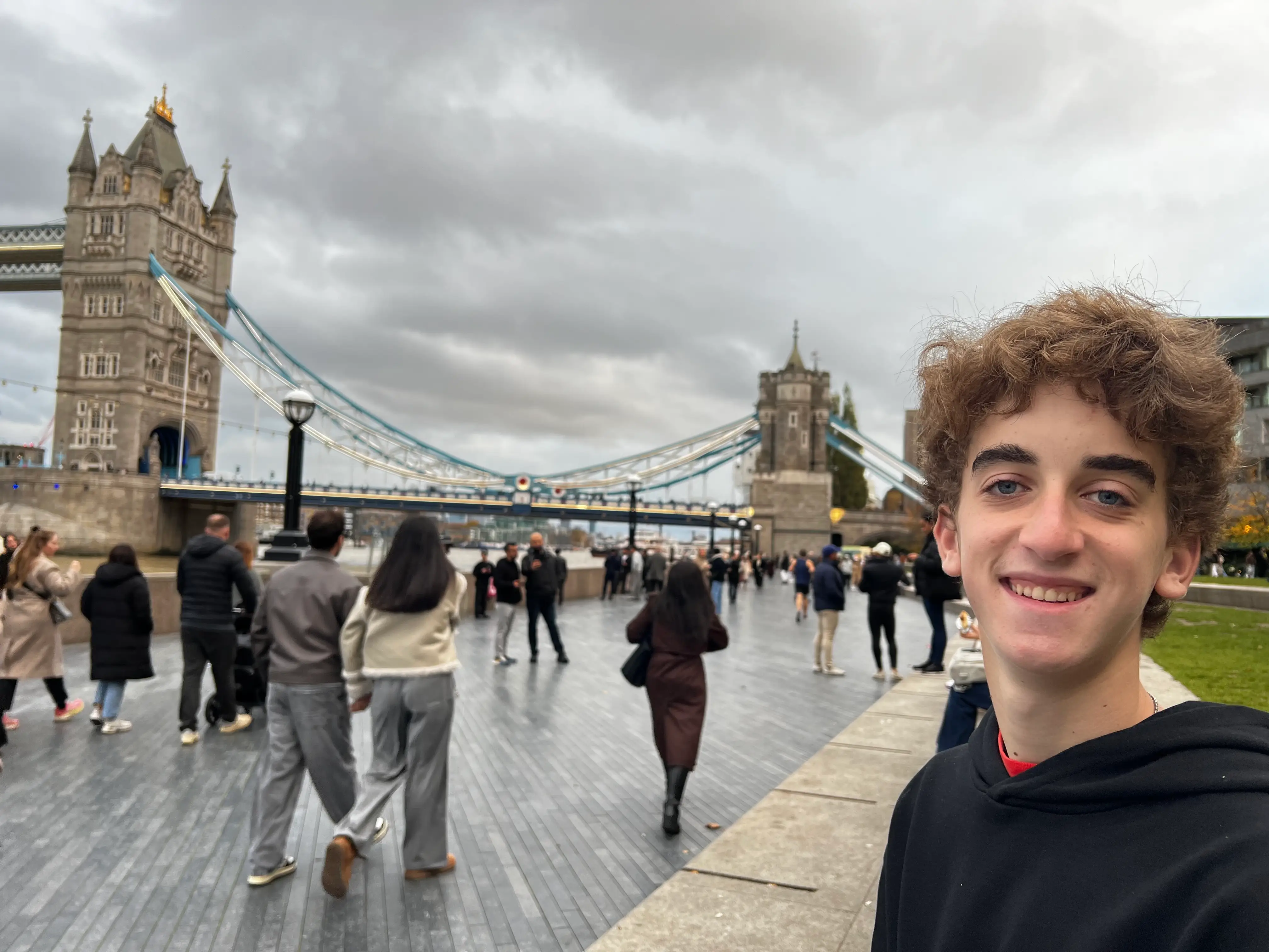 The author's son poses near the Tower Bridge.