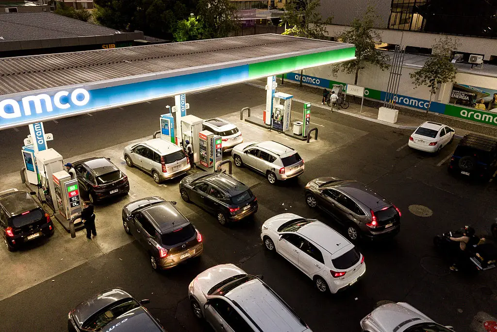 Cars line up for gas in Chile.