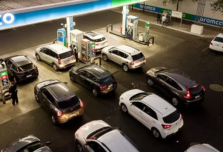 From panic buying in Chile to $8 gas in California, photos show how people around the world are grappling with a growing energy crisis