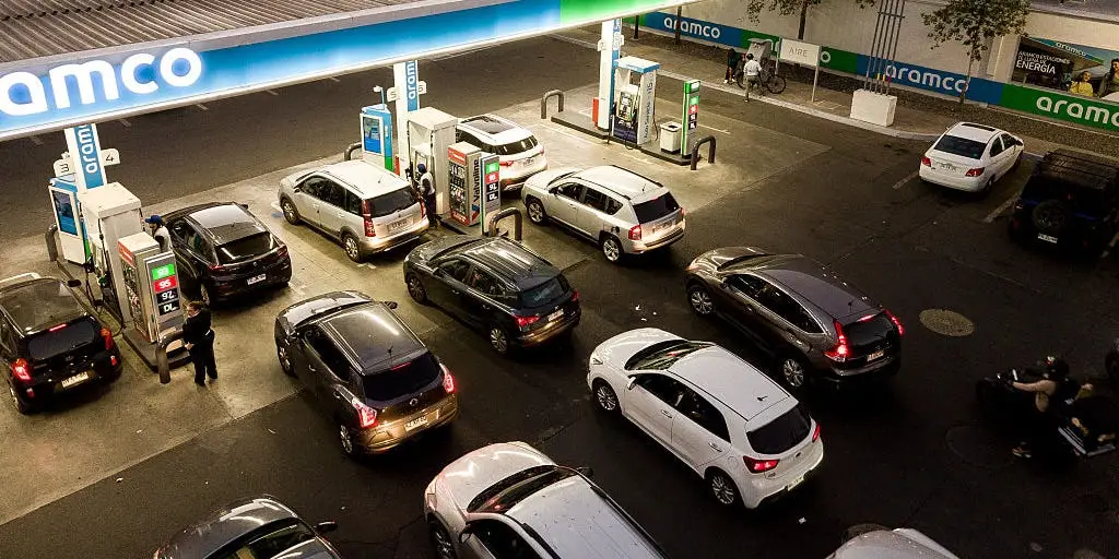 From panic buying in Chile to $8 gas in California, photos show how people around the world are grappling with a growing energy crisis