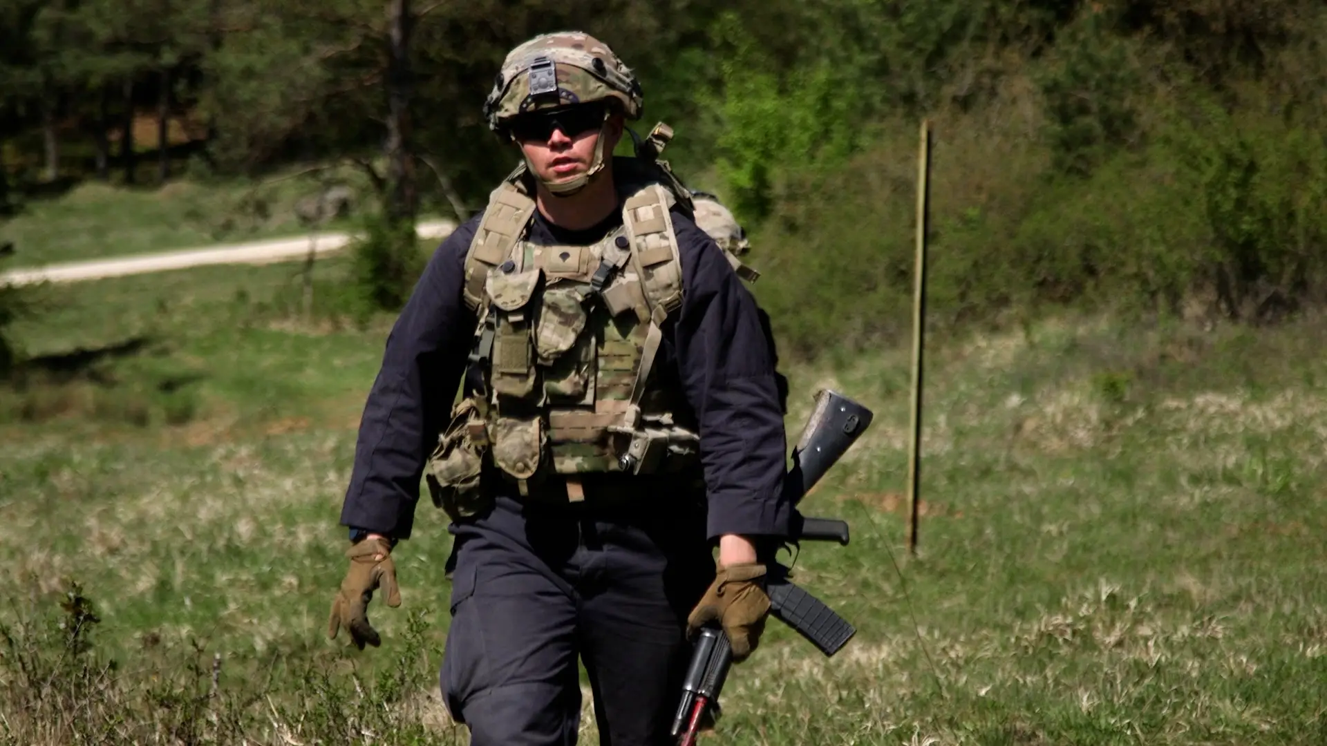 Army soldier wearing black pajamas.