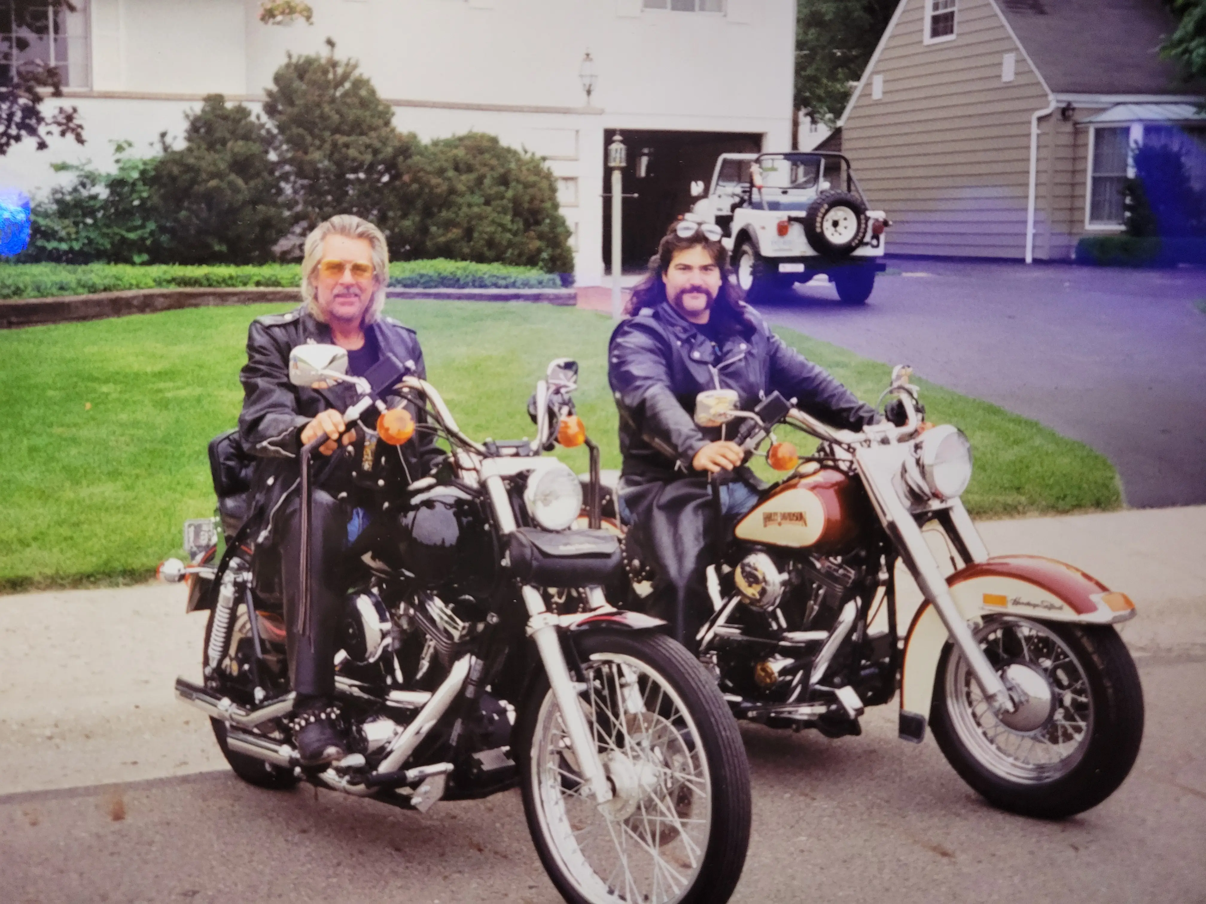 Frank D'alesio next to biker on motorcycles