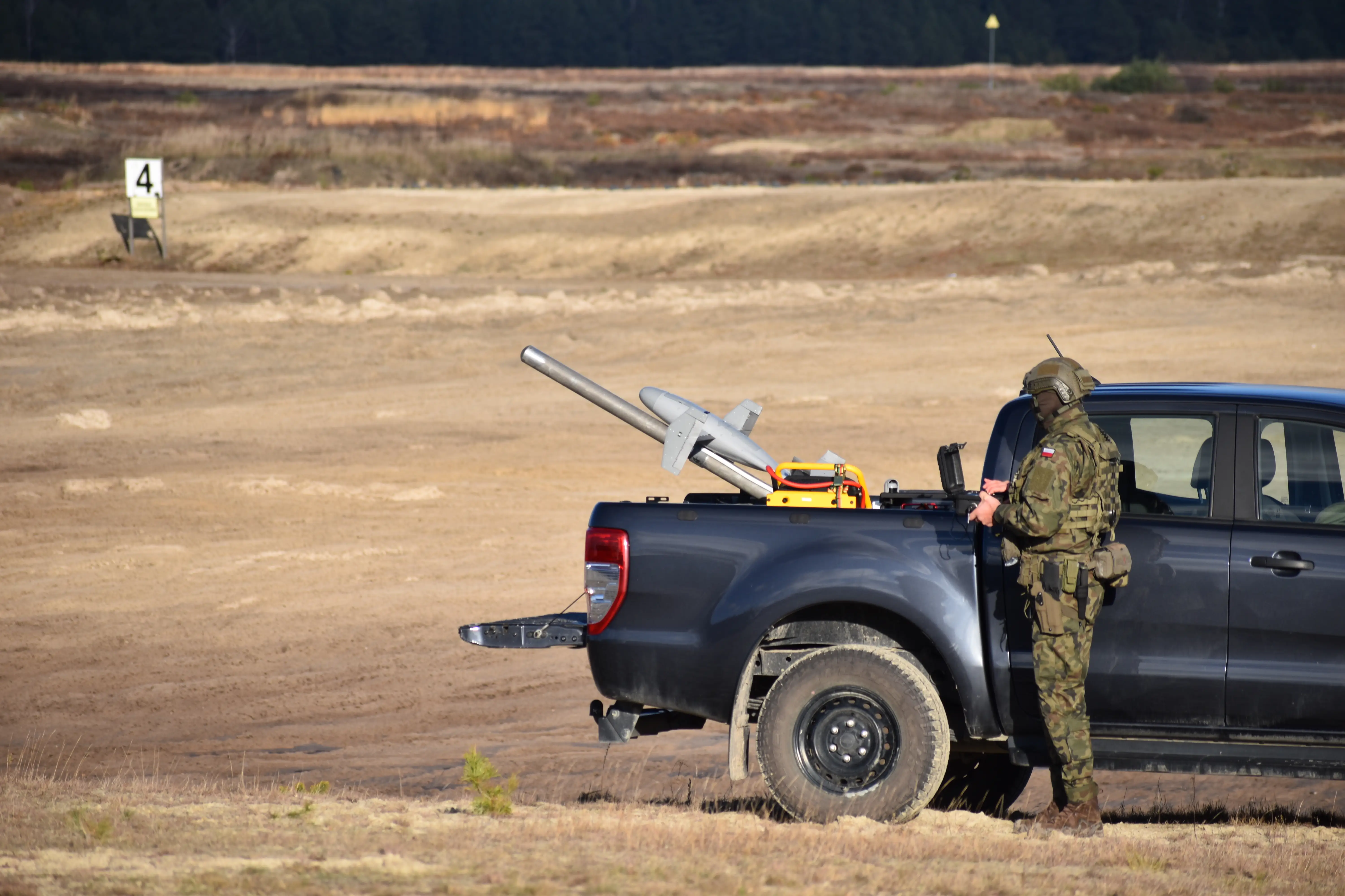 A Polish soldier launches an interceptor drone in November 2025.