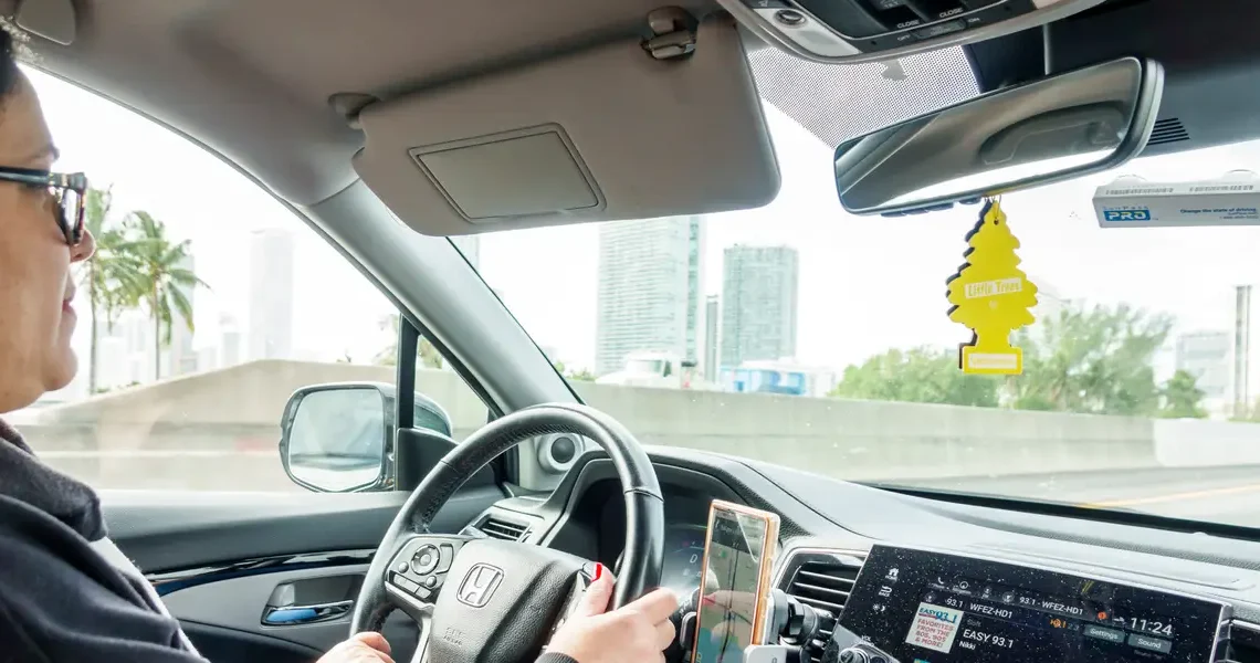 A senator is pressing the IRS to raise the mileage deduction that Uber drivers rely on to offset spiking gas prices