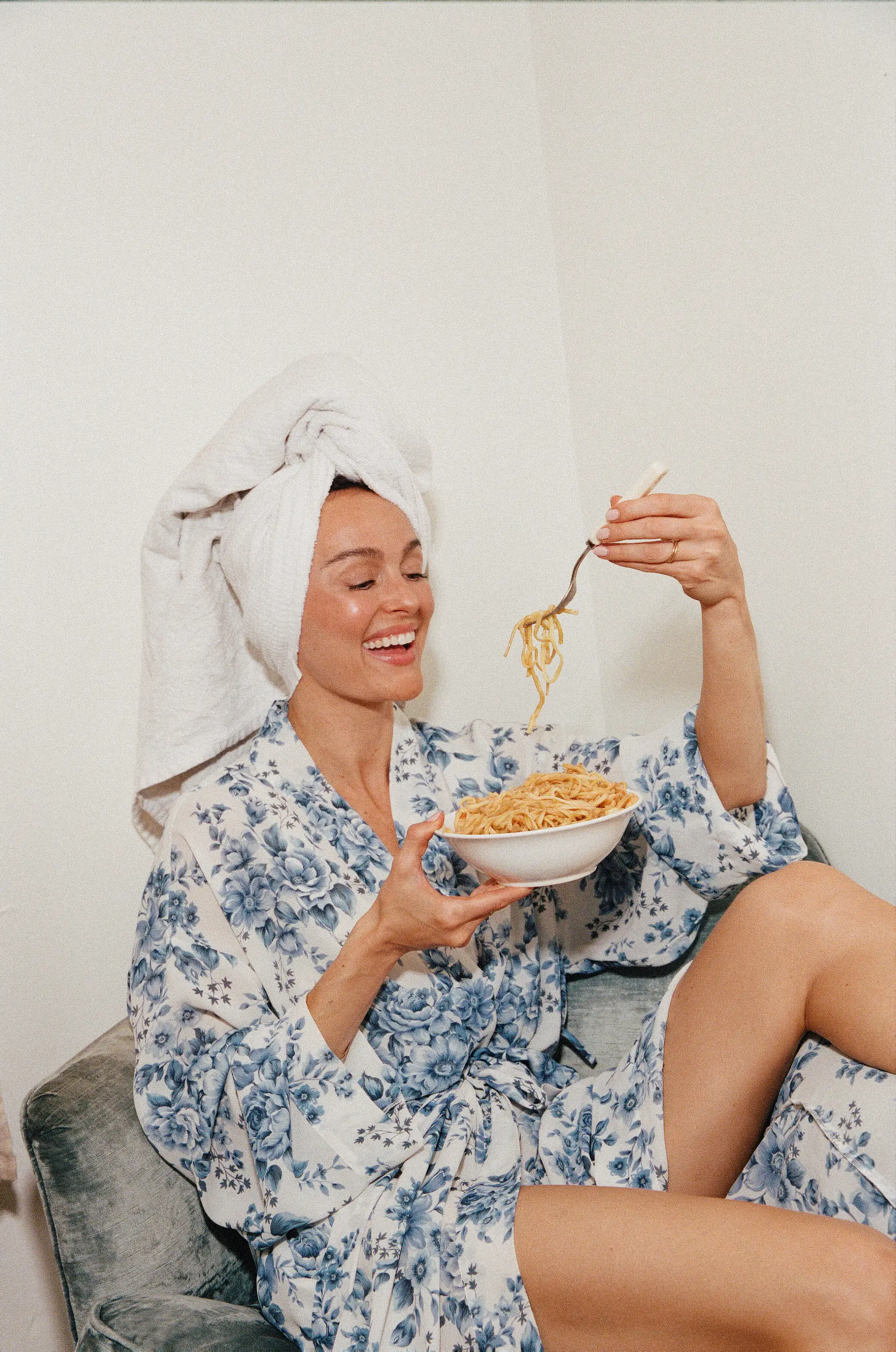 Megan Roup eating a bowl of noodles.