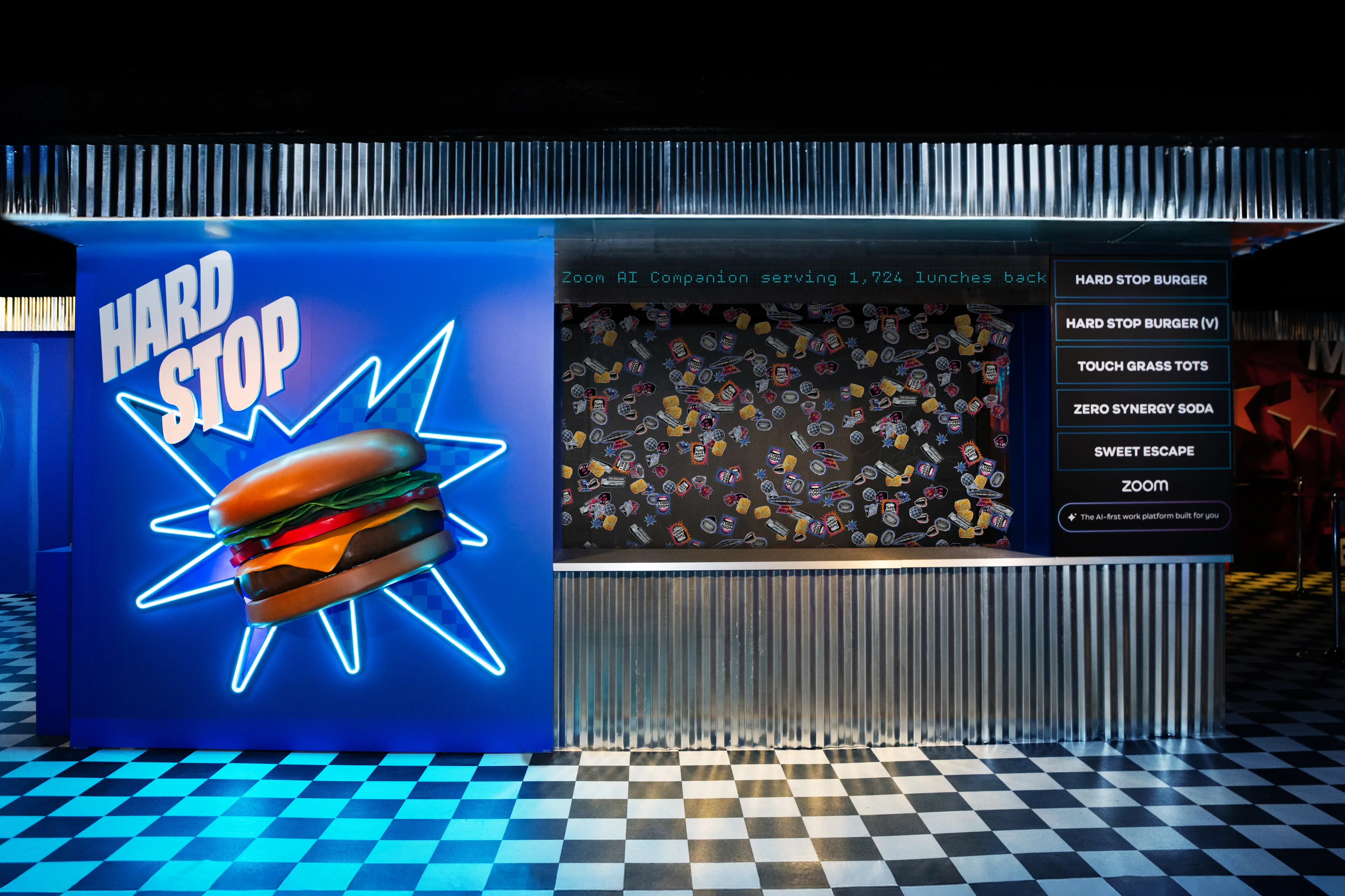 A counter at a burger restaurant with a picture of a burger