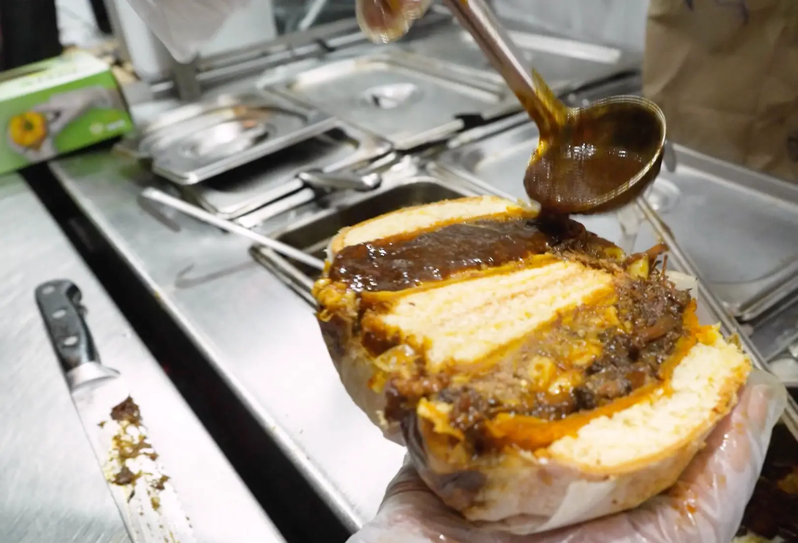 Close up of a Mac Patty on white bread.