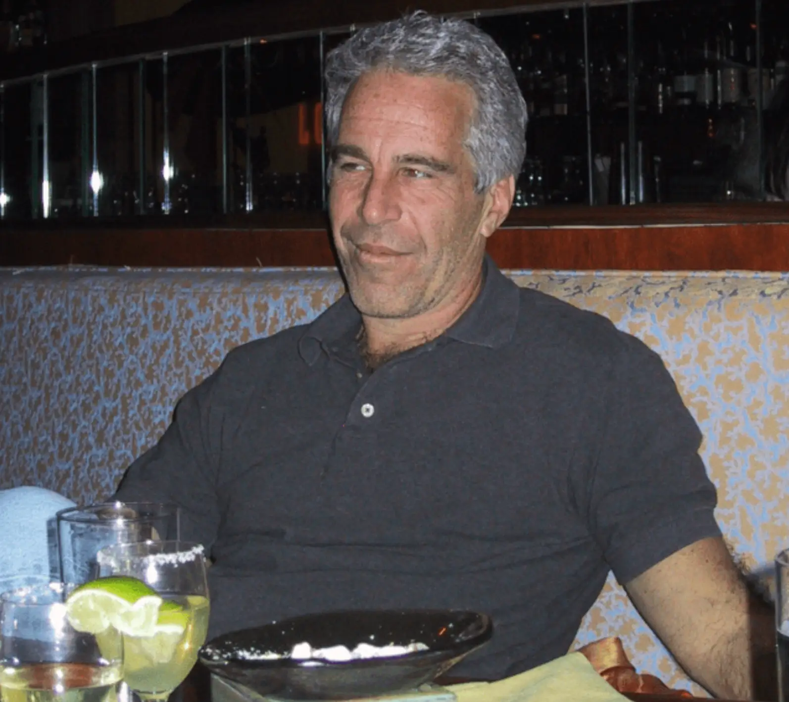 Jeffrey Epstein sits down to dinner