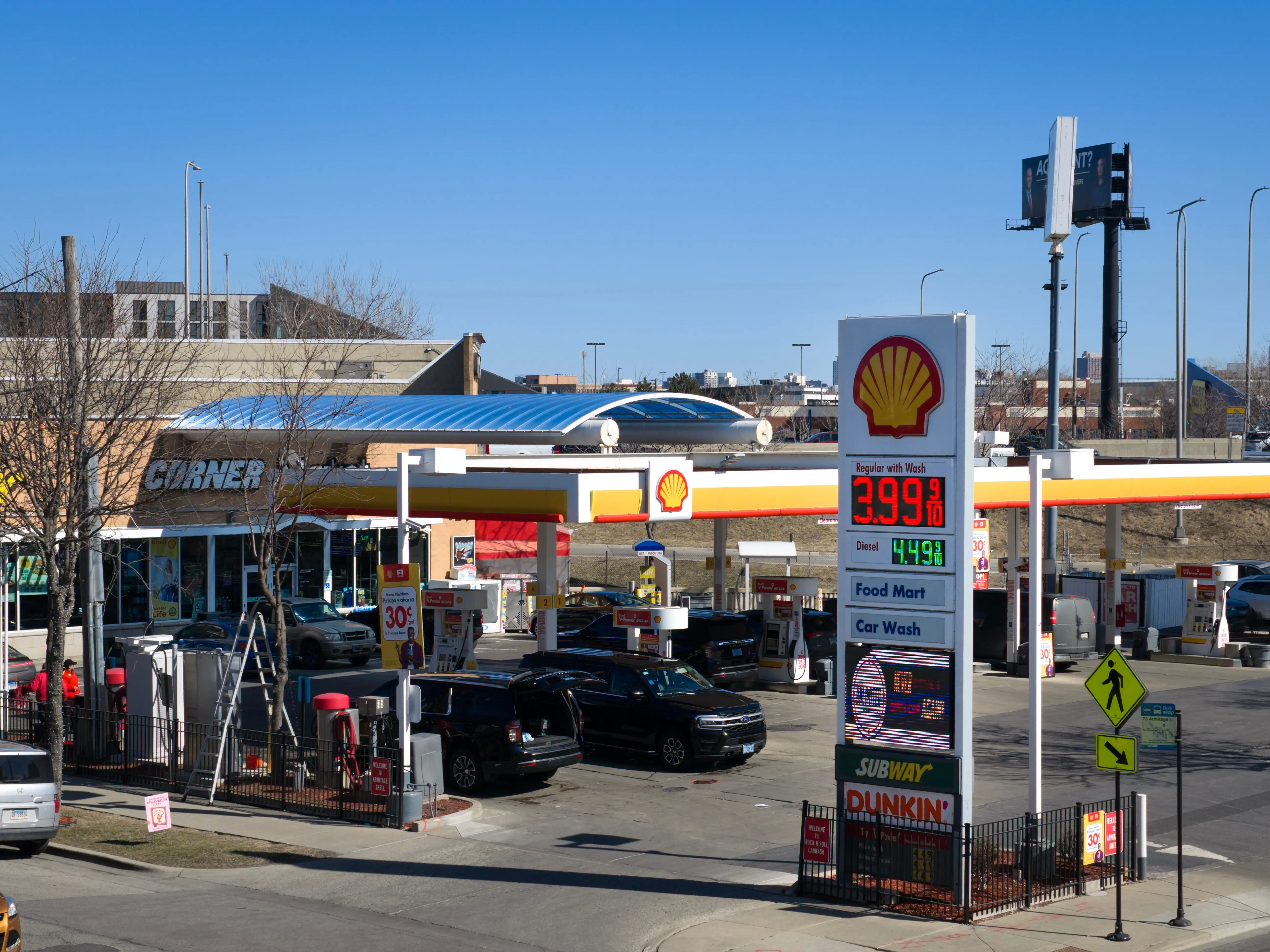 An aerial view shows a sign displaying prices for gasoline at a station on March 02, 2026, in Chicago, Illinois.