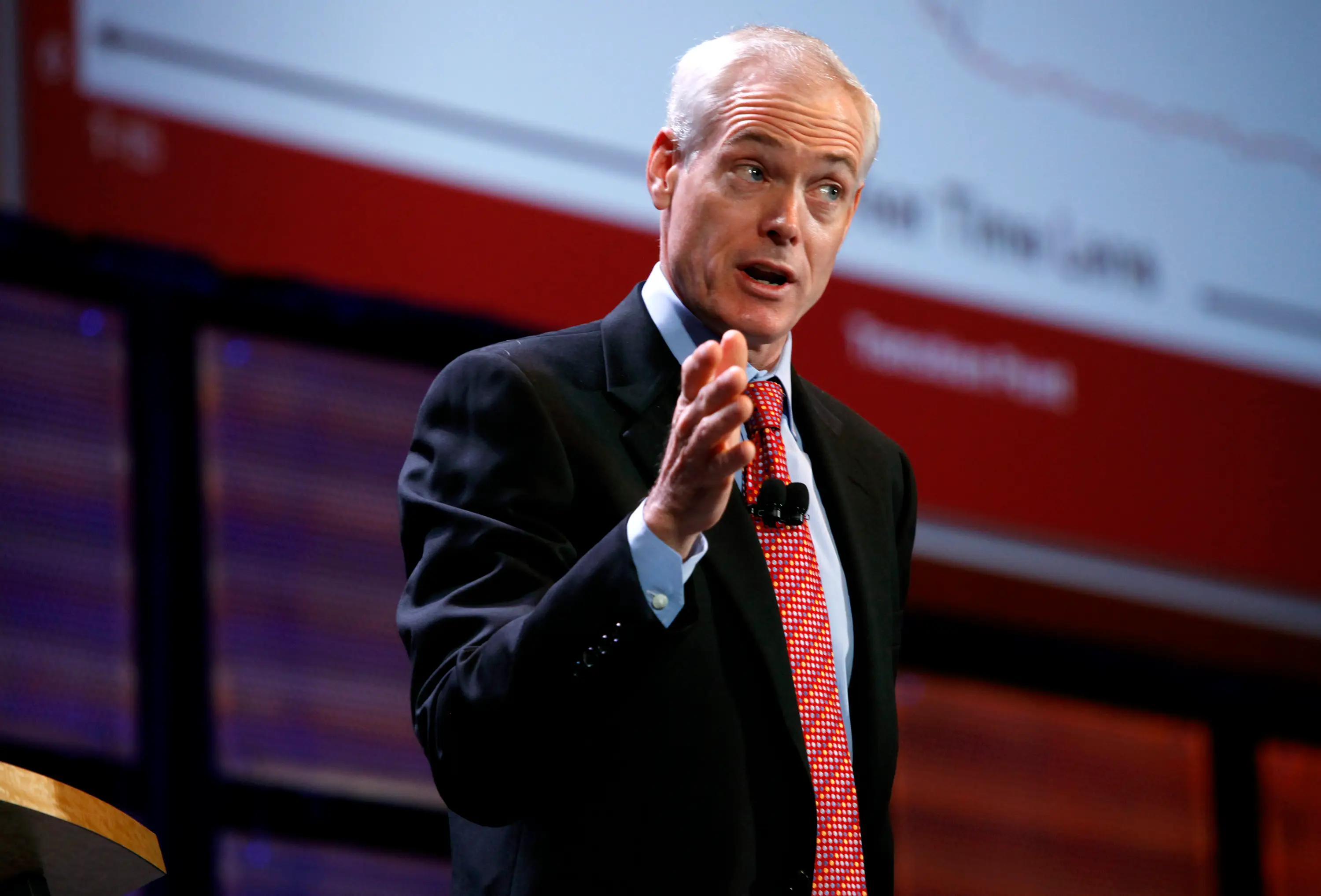 Jim Collins speaking at an event