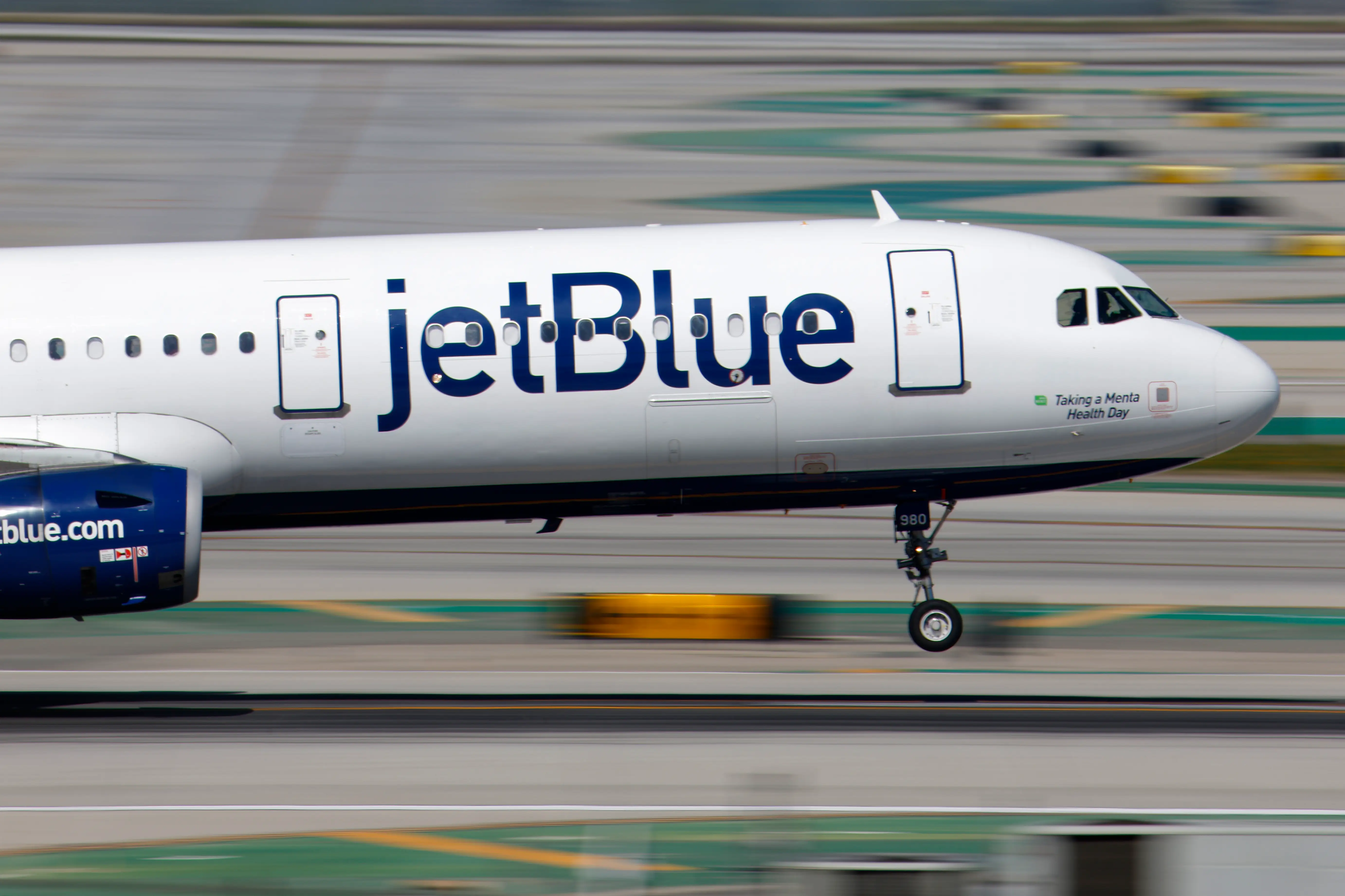 A JetBlue Airbus A321 lands at Los Angeles International Airport on March 7, 2026 in Los Angeles, California. (Photo by Kevin Carter/Getty Images)