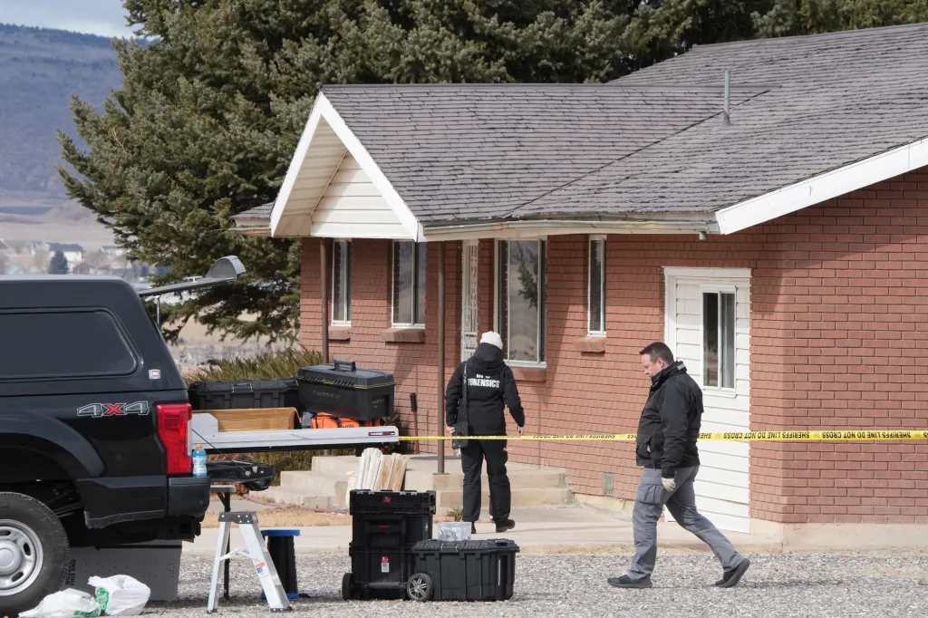 Authorities conduct an investigation at a home where a woman was found dead in Lyman, Utah, Thursday, March 5, 2026.