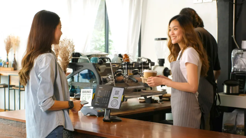 Grotts says customers should remain off their phones while on line at a coffee shop.