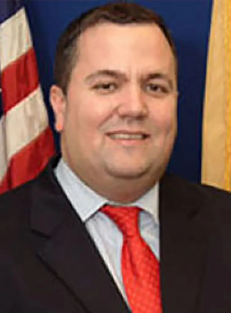 Headshot of Albert Coutinho.