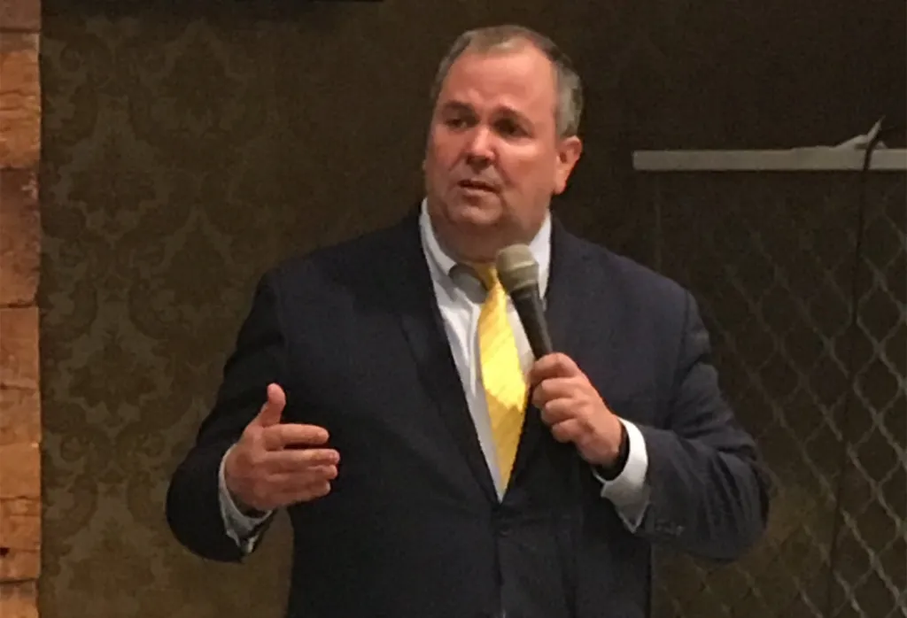Former Assemblyman Albert Coutinho speaking at an event.