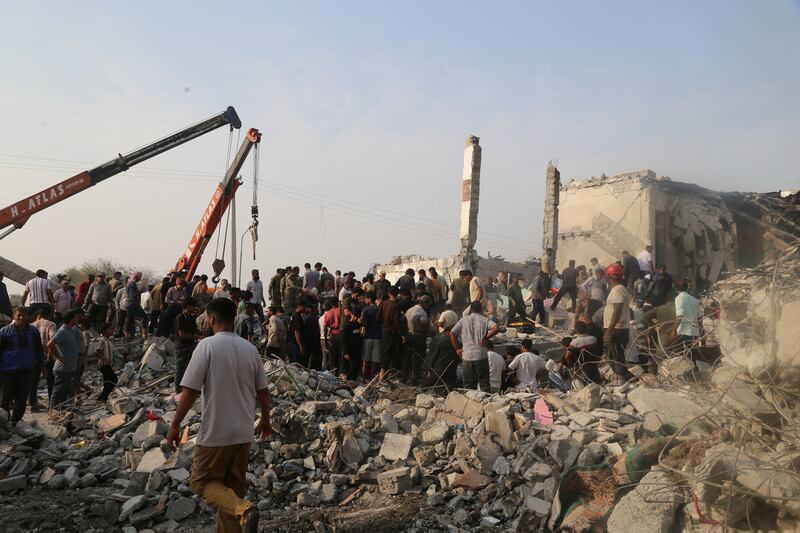 People and rescue forces work following a reported strike on a school in Minab, Iran, February 28, 2026. Abbas Zakeri/Mehr News/WANA (West Asia News Agency) via REUTERS ATTENTION EDITORS - THIS PICTURE WAS PROVIDED BY A THIRD PARTY.  REFILE – REMOVING ATTRIBUTION TO STRIKE