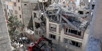 Israel Vows to ‘Intensify and Expand’ Strikes Against Iran, as Tehran Warns Civilians Near U.S. Targets to Evacuate