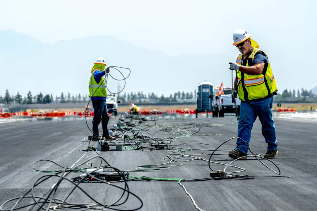 Electricians at work at the Ontario airport.